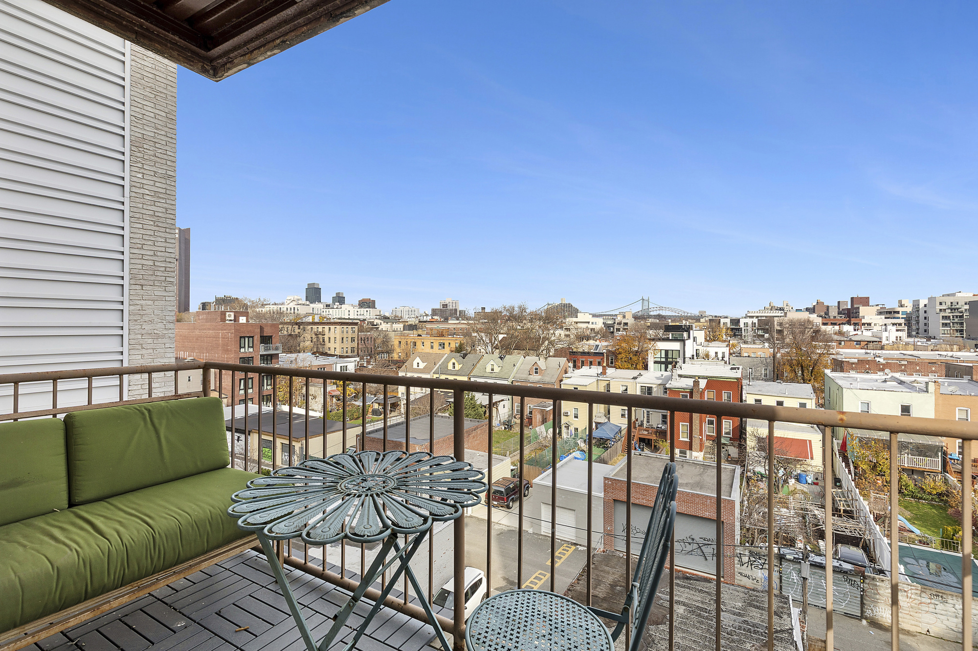 14-25 Broadway, Unit 5R Queens, NY 11106 - Photo 2 of 5 a view of a balcony with chairs