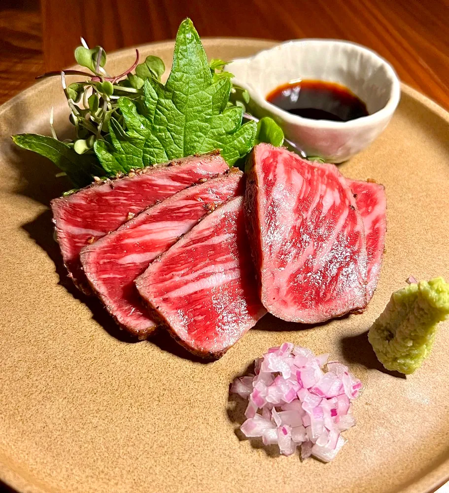a outdoor space with lots of tables and chairs