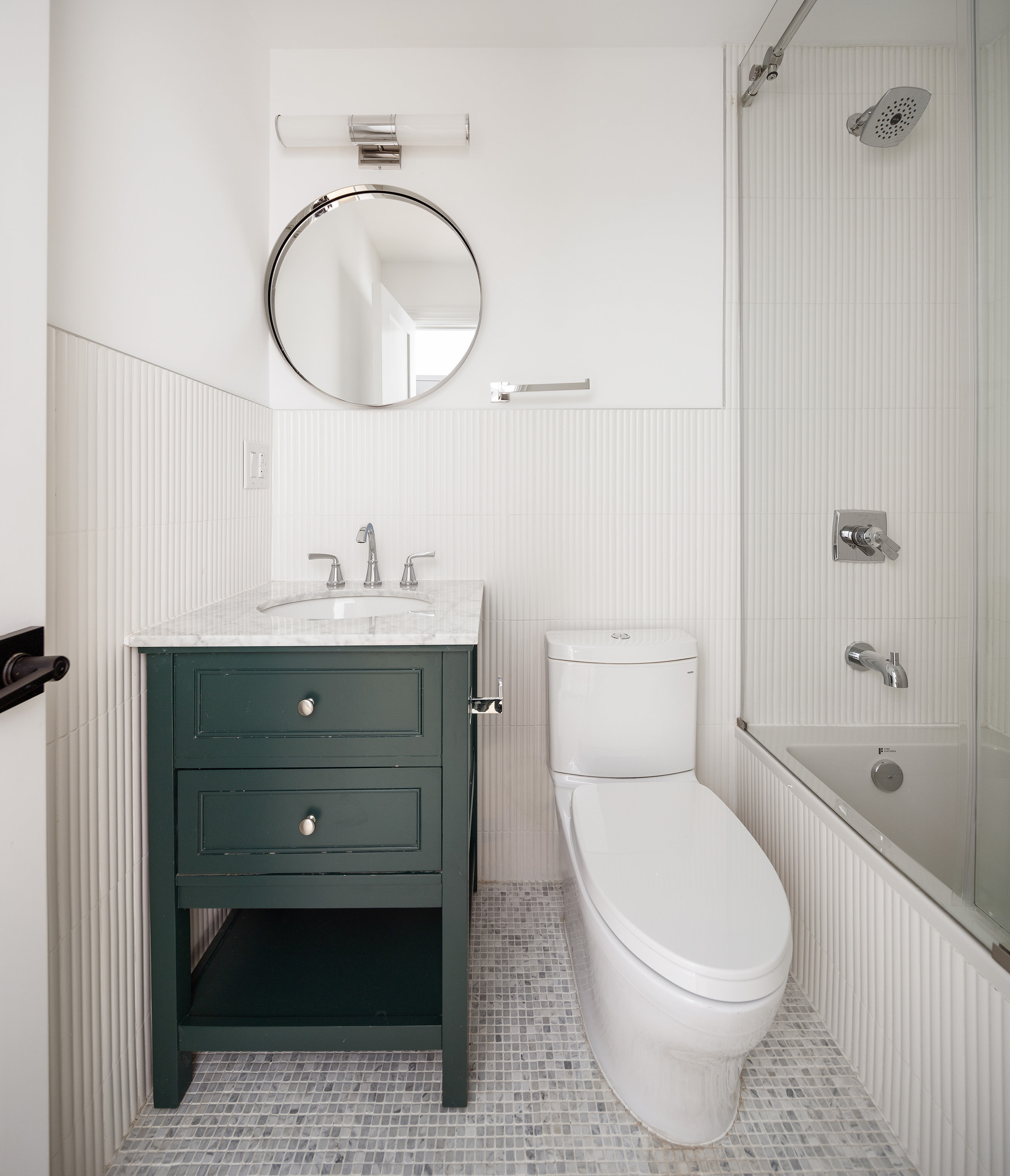 698 Macon Street Brooklyn, NY 11233 - Photo 11 of 17 a bathroom with a sink toilet and shower