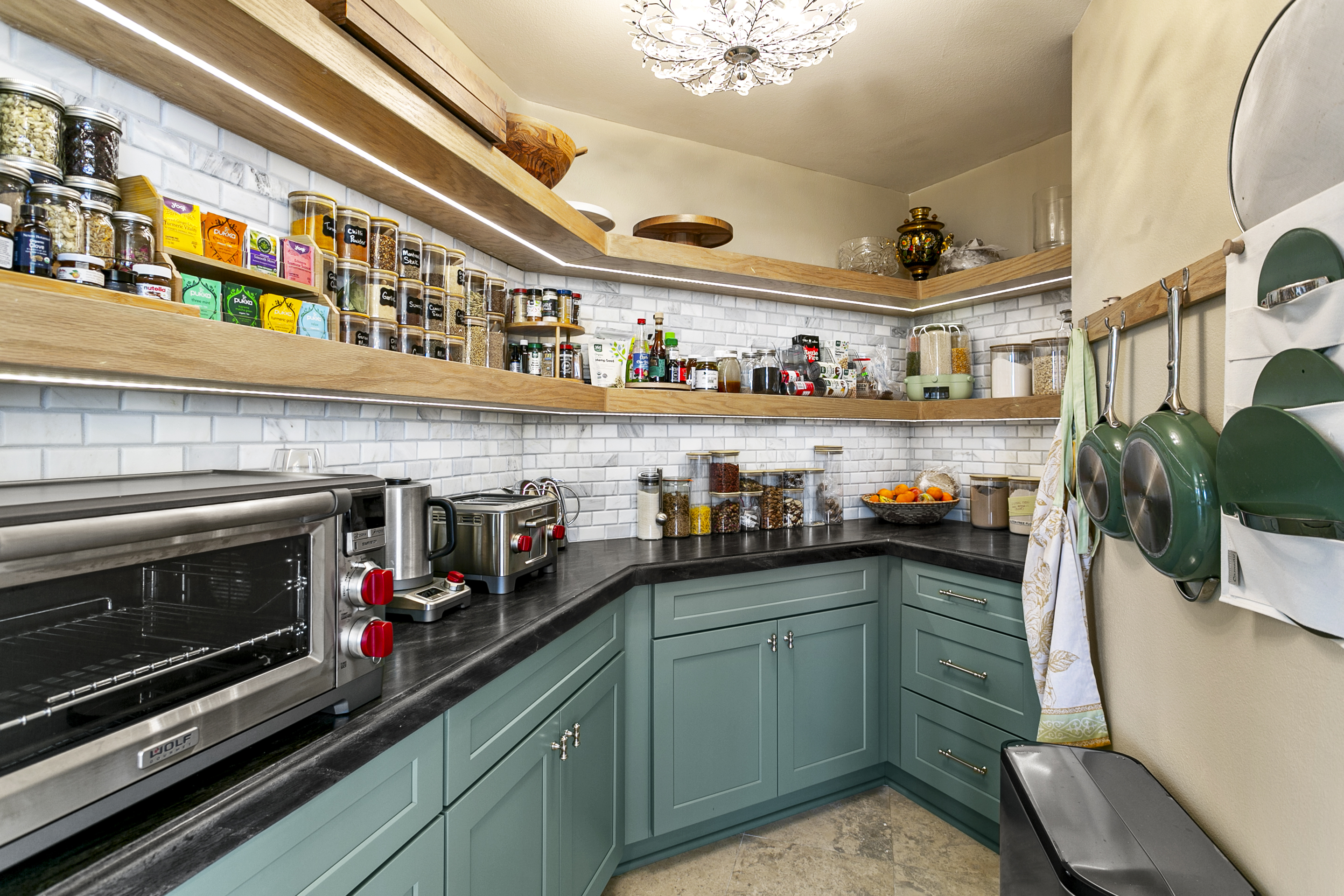 10 Vista Montemar Laguna Niguel, CA 92677 - Photo 33 of 67 a kitchen with lots of clutter and cabinets