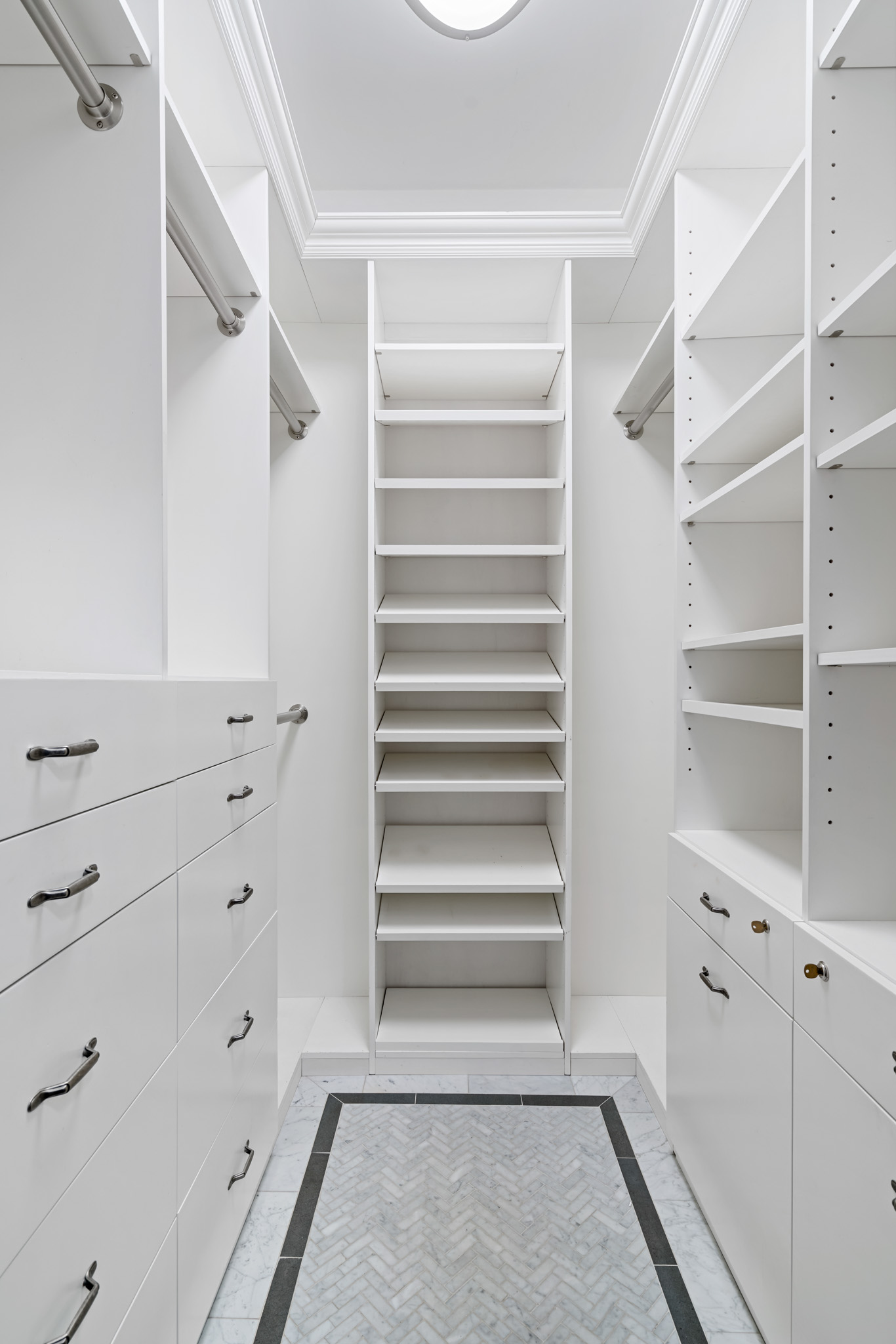 299 West 12th Street, Unit 3JH Manhattan, NY 10014 - Photo 11 of 15 a view of walk in closet with empty racks