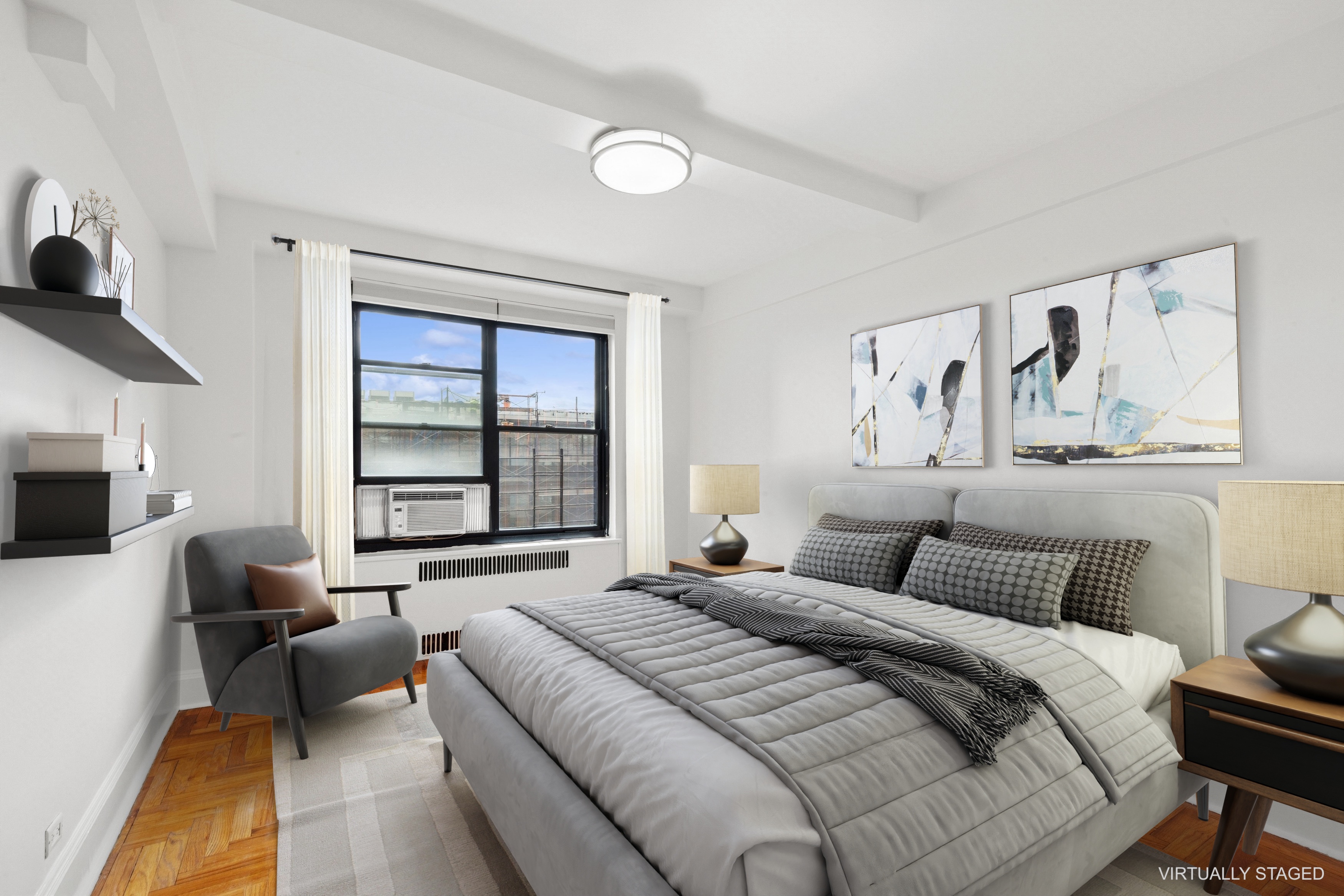 55 Park Terrace East, Unit B74 Manhattan, NY 10034 - Photo 14 of 26 a bedroom with a large bed and a couch