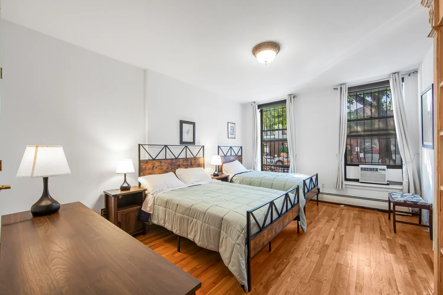 a bedroom with a bed and a table in it