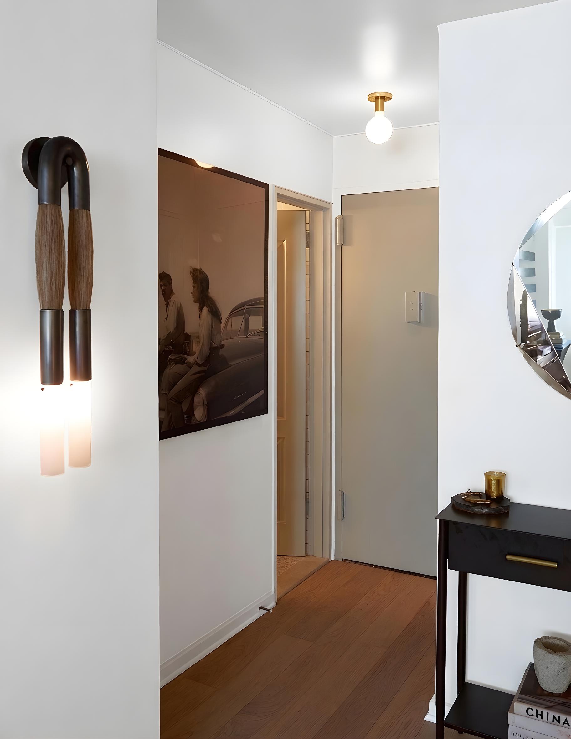 101 West 12th Street, Unit 15P Manhattan, NY 10011 - Photo 5 of 16 a view of a hallway with front door and wooden floor