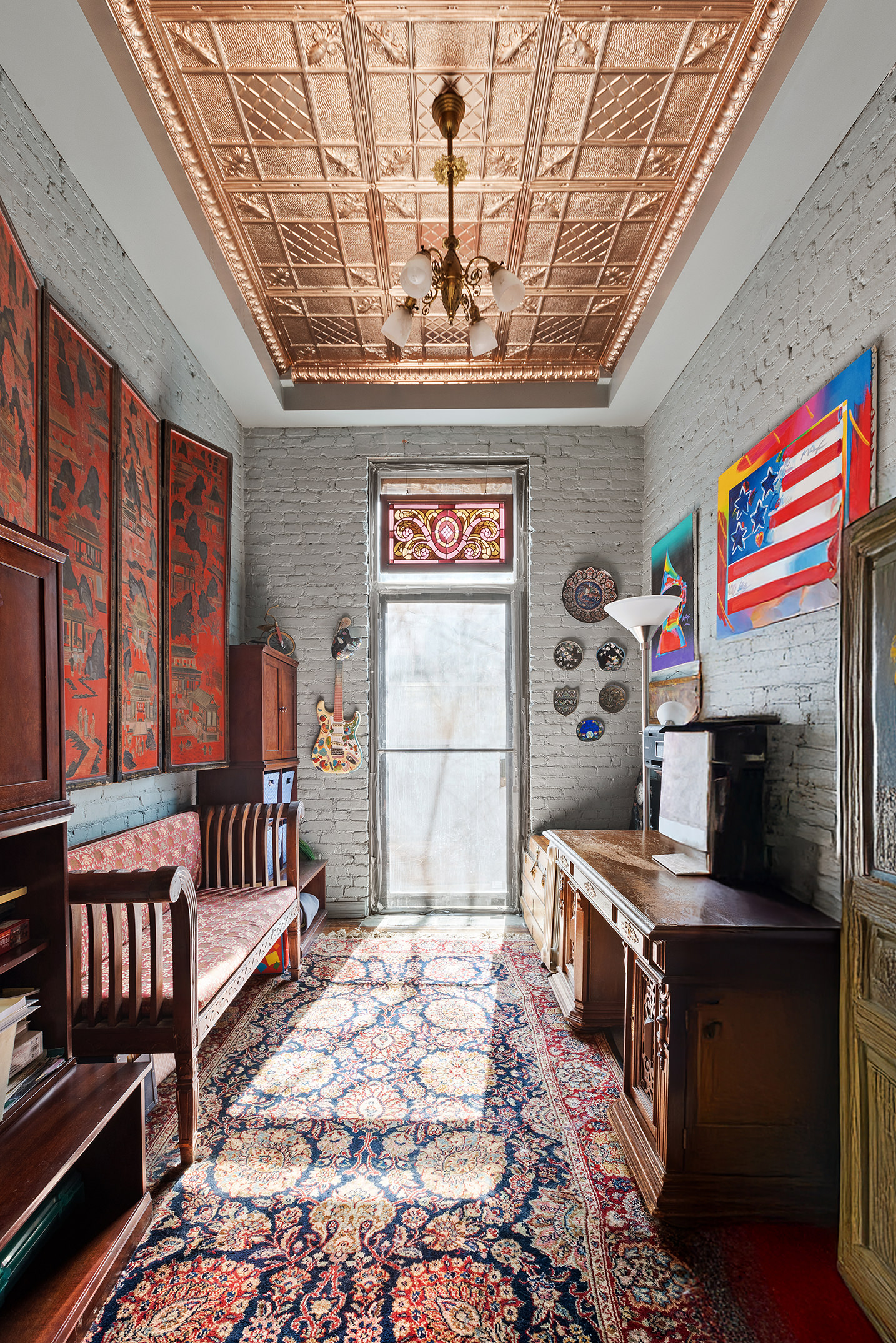138 West 73rd Street Manhattan, NY 10023 - Photo 8 of 35 a living room with fireplace furniture and a chandelier