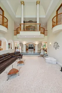 a view of a livingroom with furniture and a fireplace