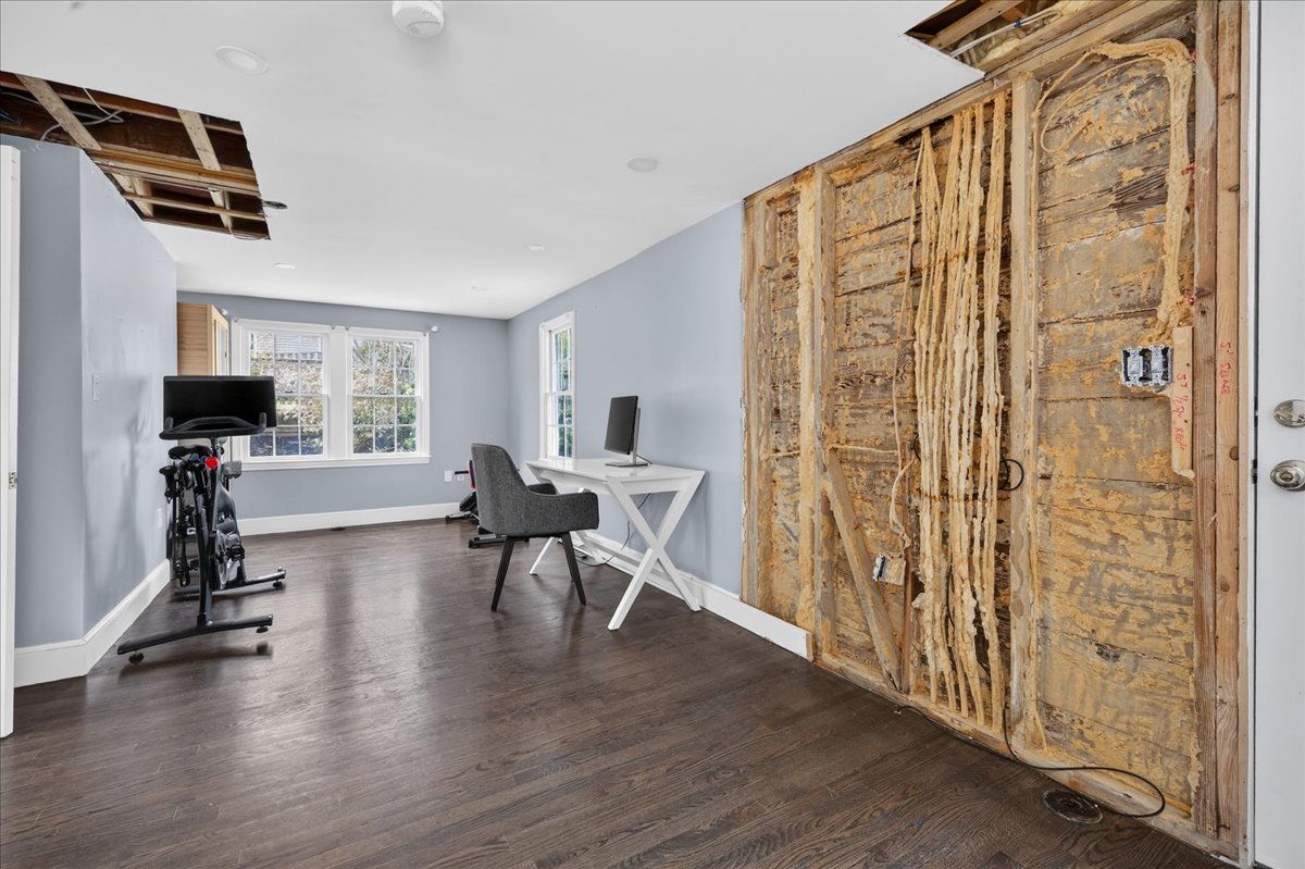 6 Studley Road Hingham, MA 02043 - Photo 7 of 27 a living room with furniture and a flat screen tv