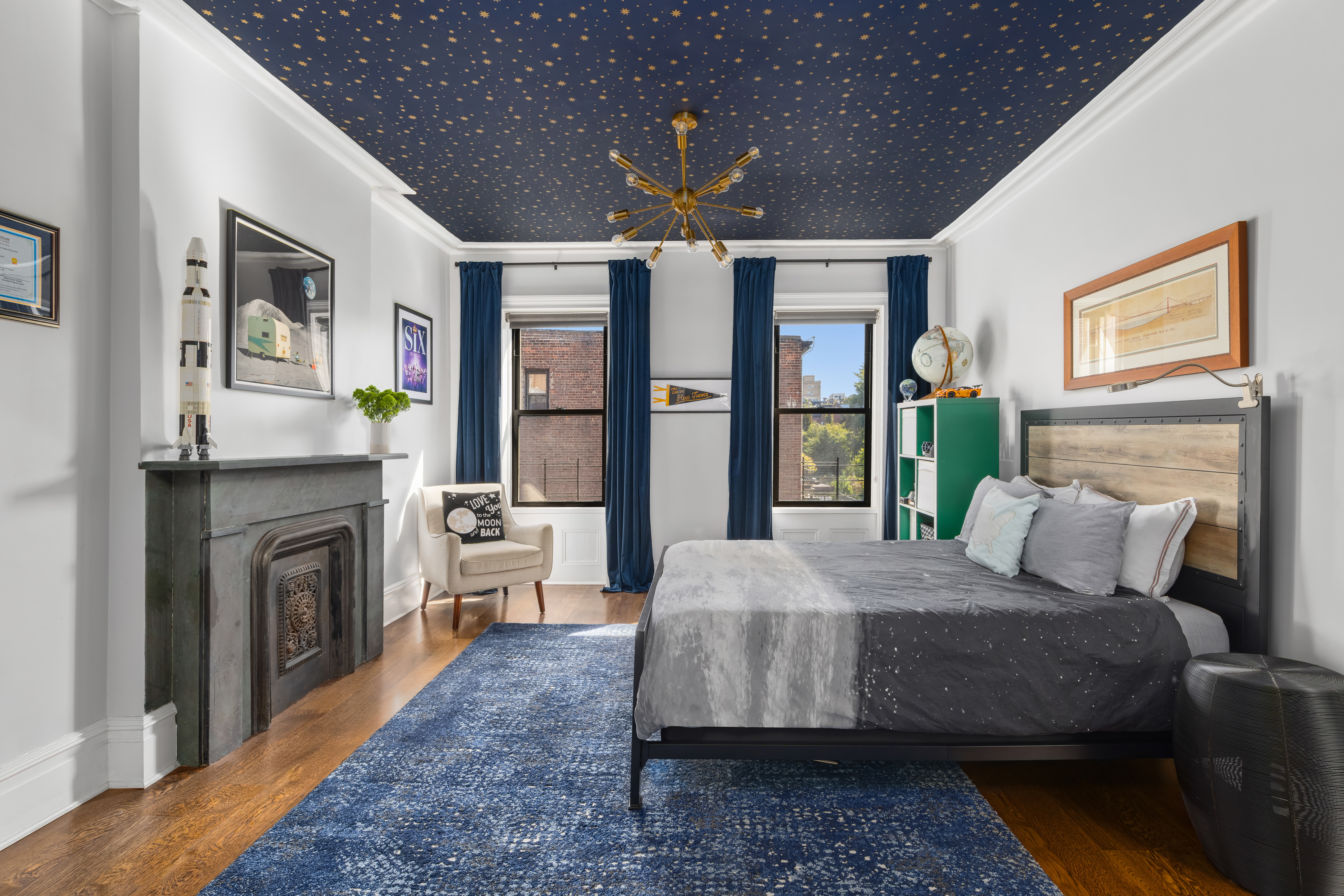 159 6th Avenue, Unit TRIPLEX Brooklyn, NY 11217 - Photo 7 of 19 a spacious bedroom with a bed dresser and a large window