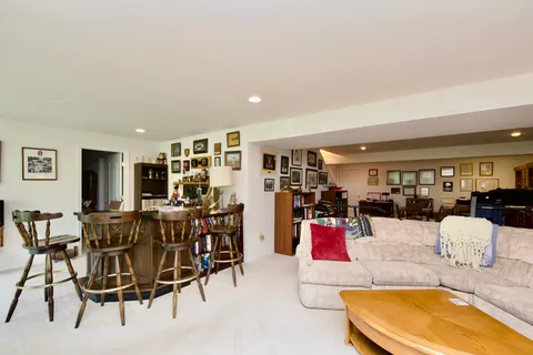 a bedroom with a bed and a table in it