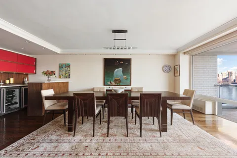 a view of a dining room with furniture