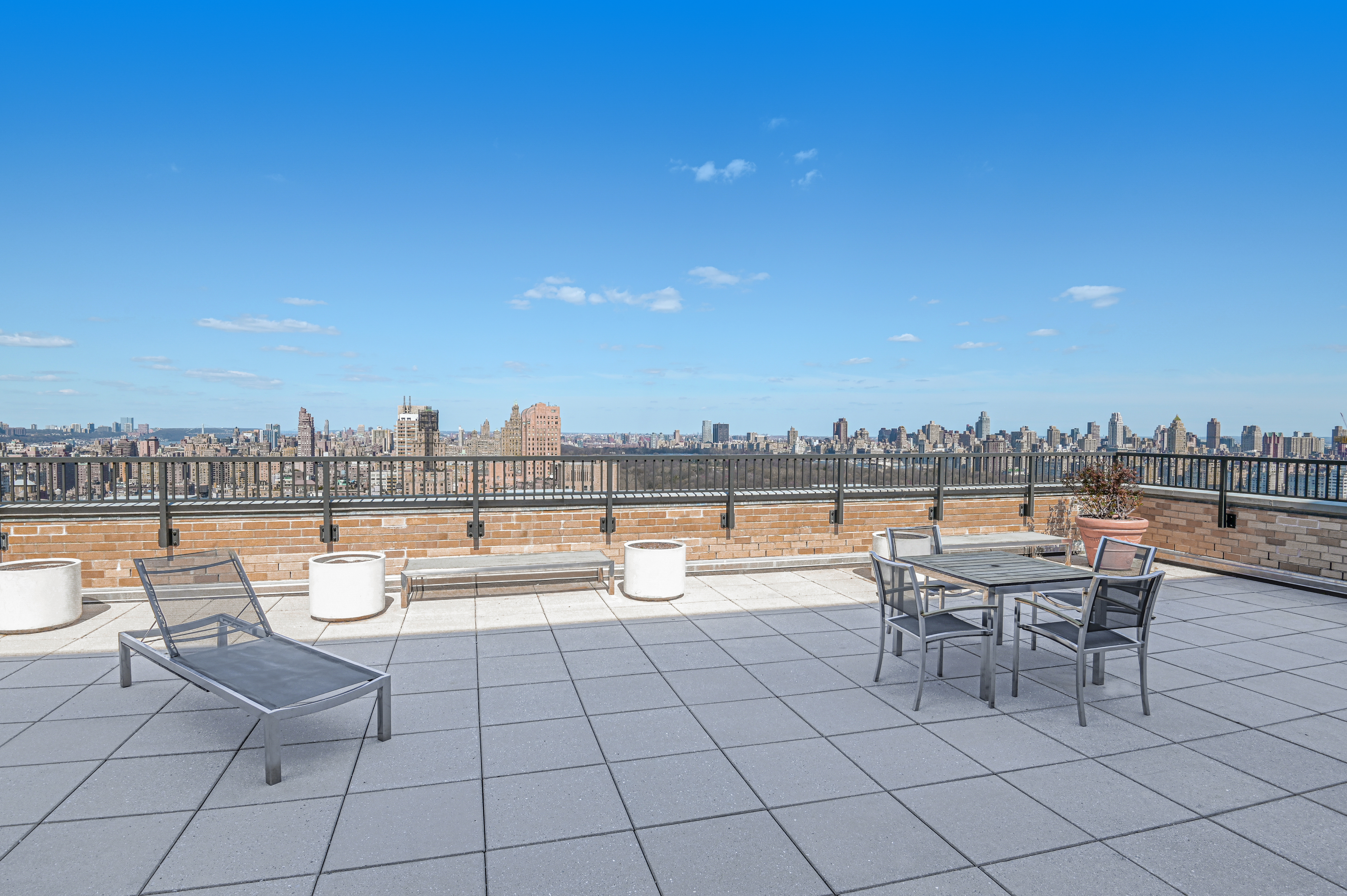10 West 66th Street, Unit 7C Manhattan, NY 10023 - Photo 11 of 19 a view of a terrace with furniture and city view