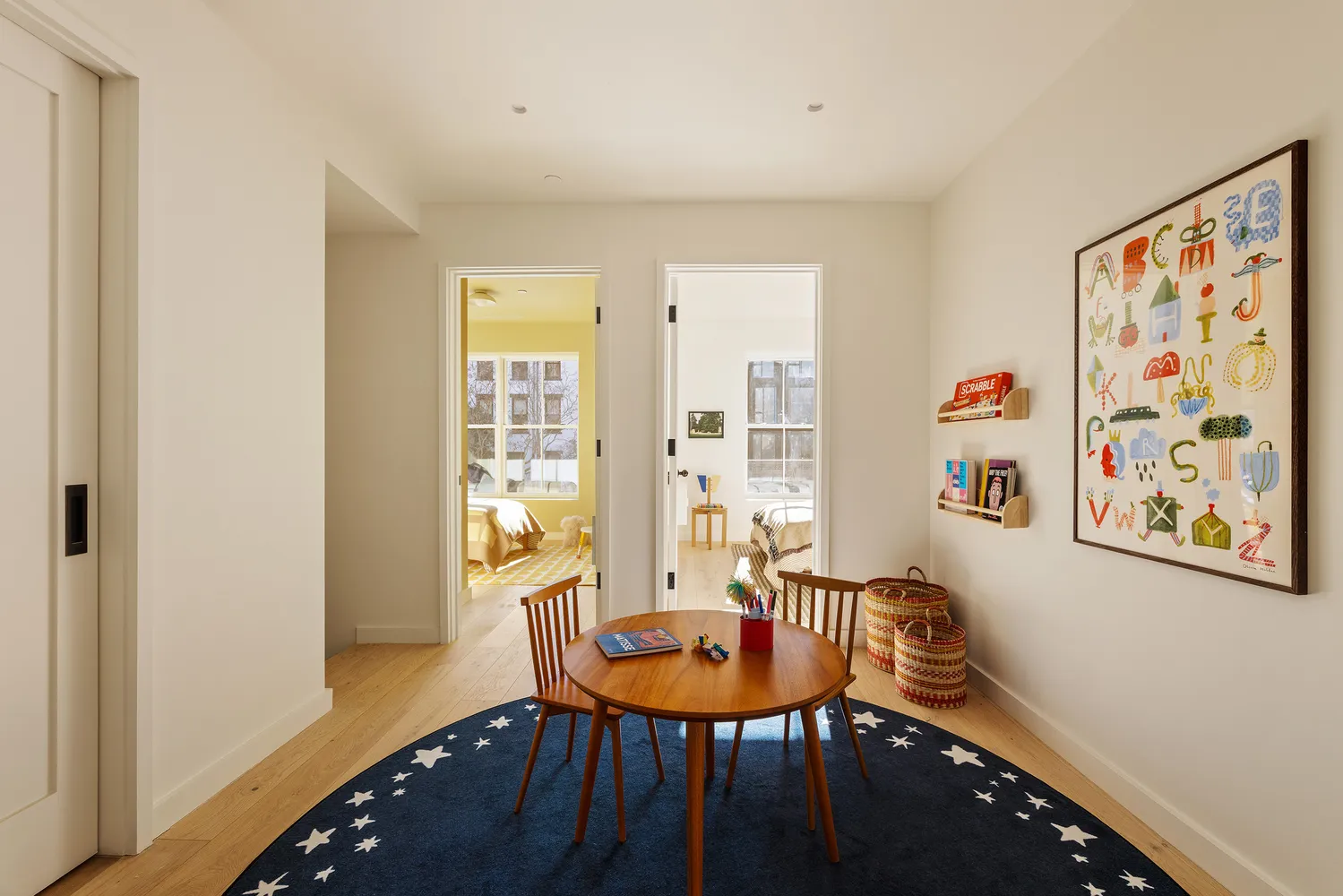 a view of a room with furniture window and wooden floor