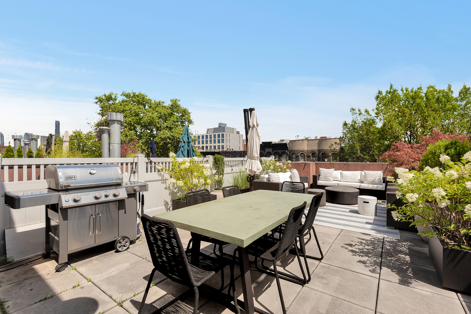a dinning table and chairs in the patio