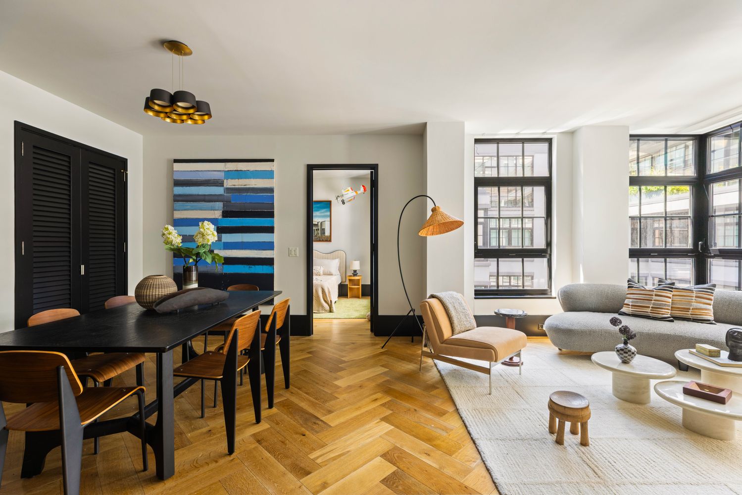 a living room with furniture and a table