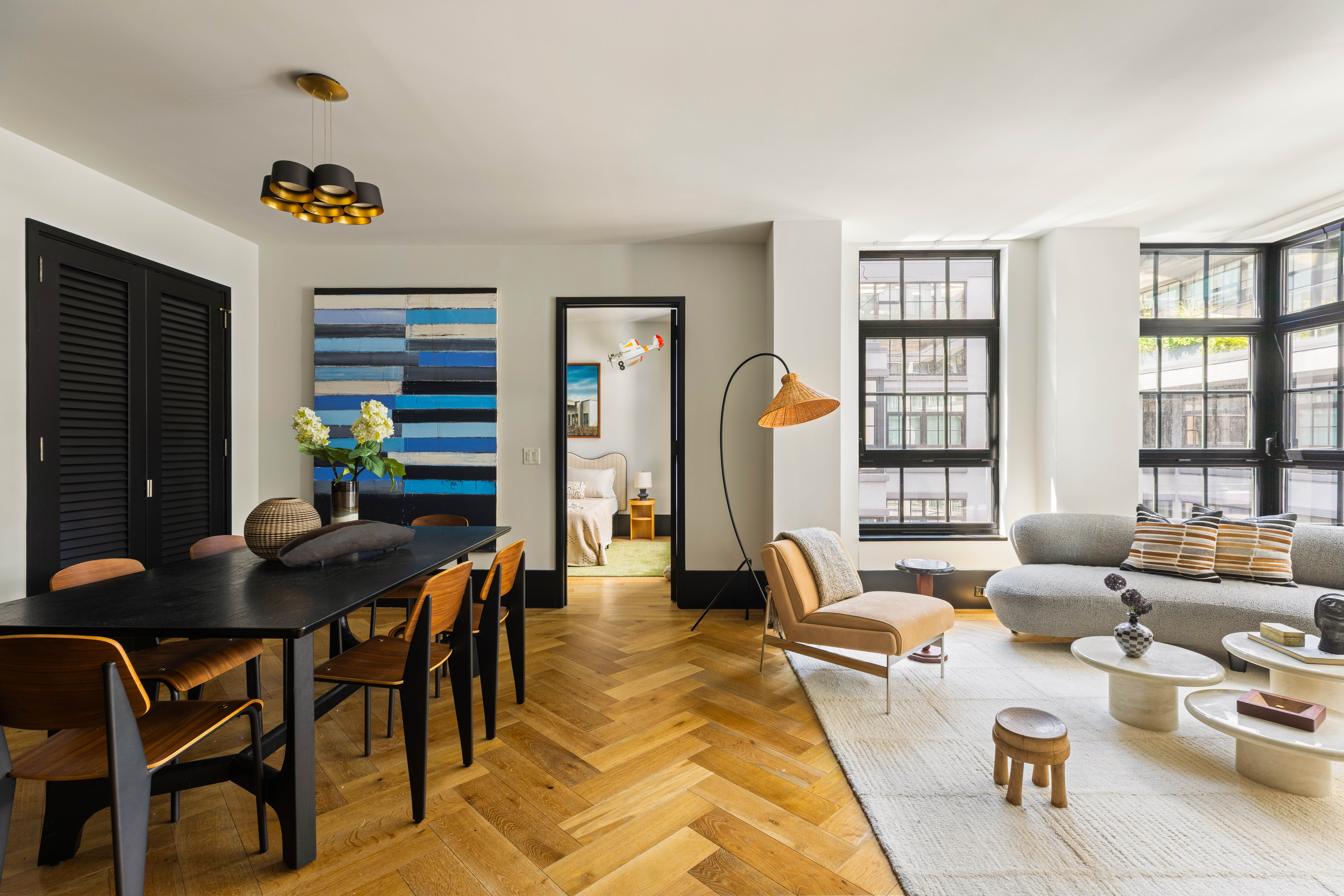 a living room with furniture and a table
