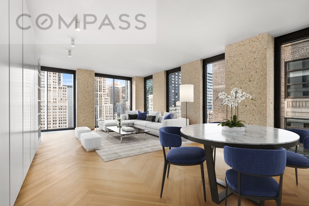 16 West 40th Street, Unit 21B Manhattan, NY 10018 - Photo 2 of 18 a view of a dining room with furniture window and outside view