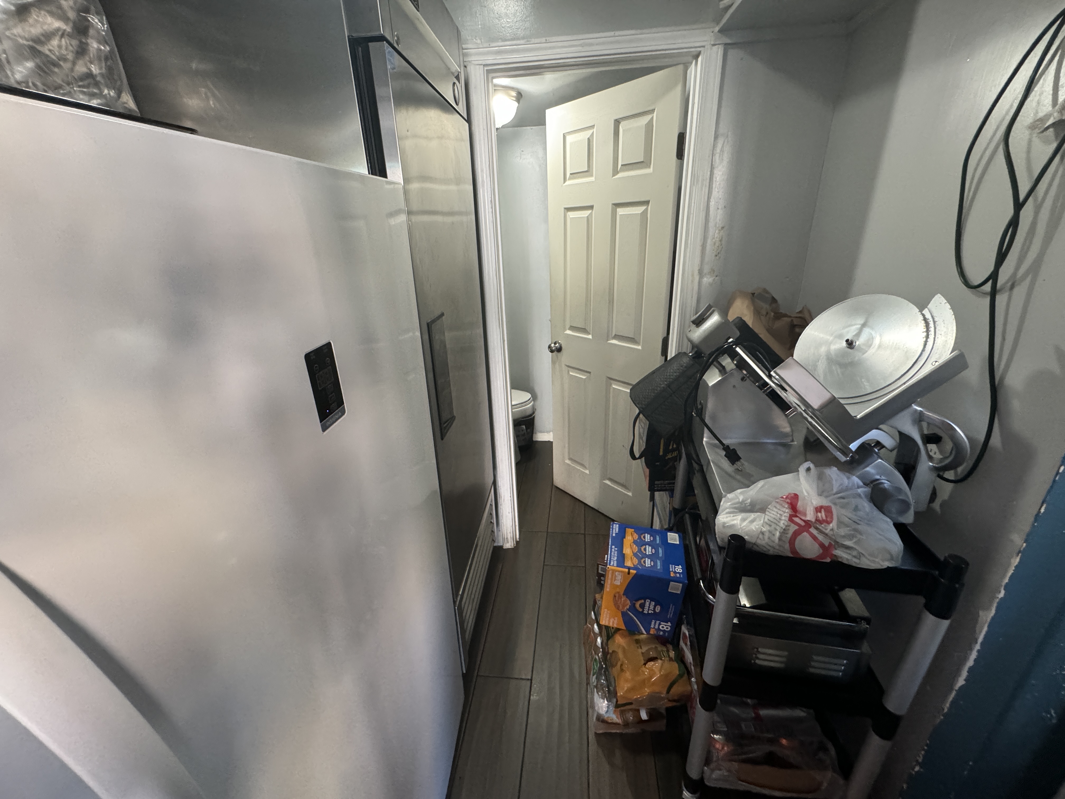 201 Fell Street San Francisco, CA 94102 - Photo 11 of 30 a bathroom with a sink and mirror with toilet