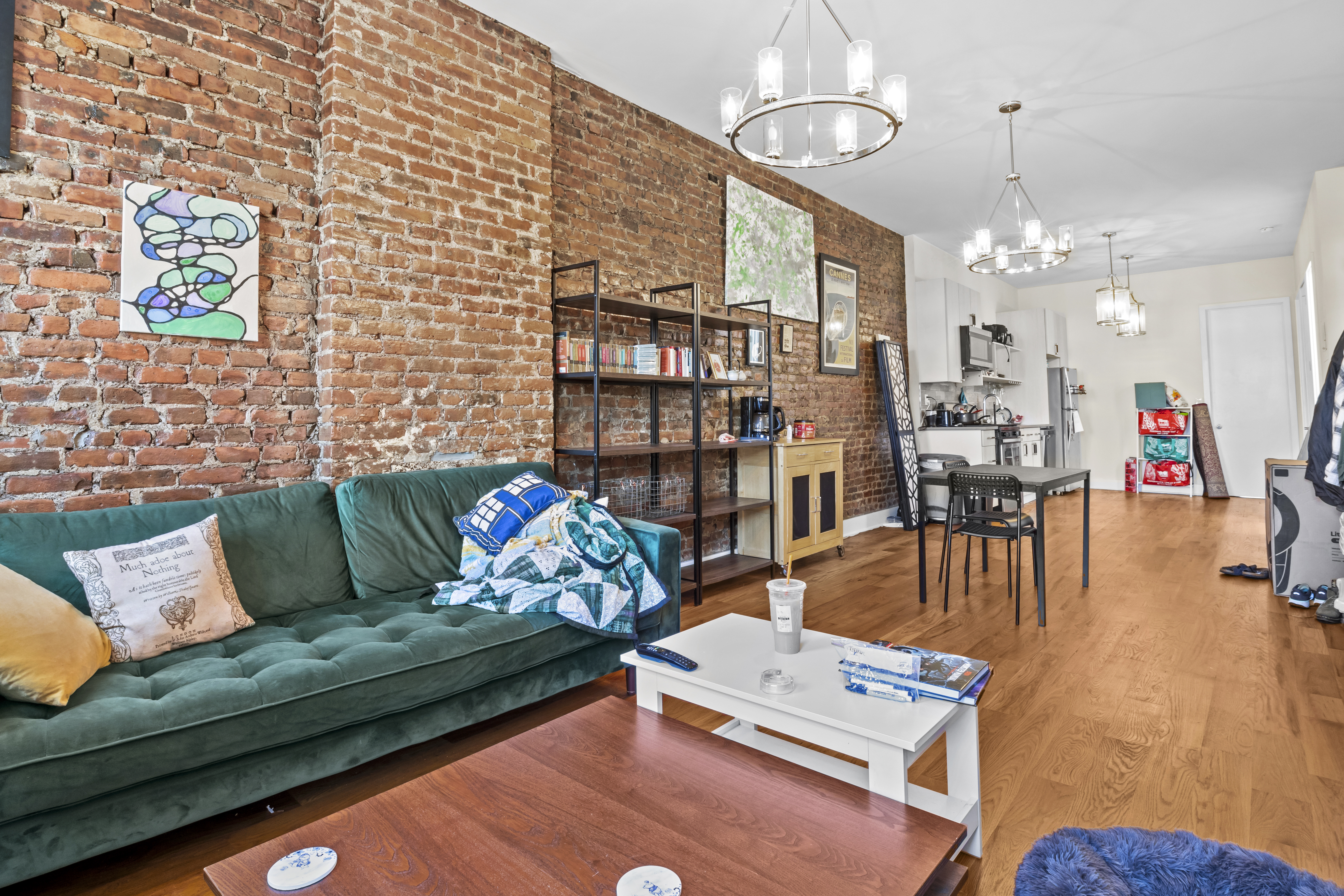 1273 Rogers Avenue, Unit MULTIFAM Brooklyn, NY 11226 - Photo 9 of 13 a living room with furniture and wooden floor