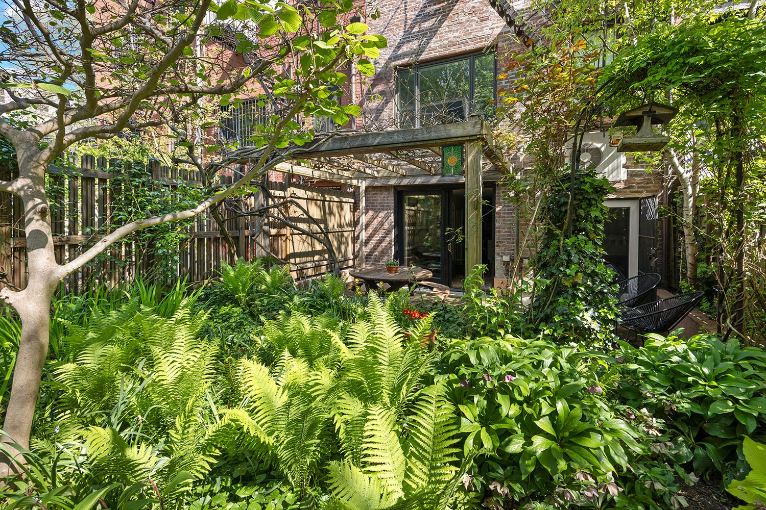 front view of a house with a small yard