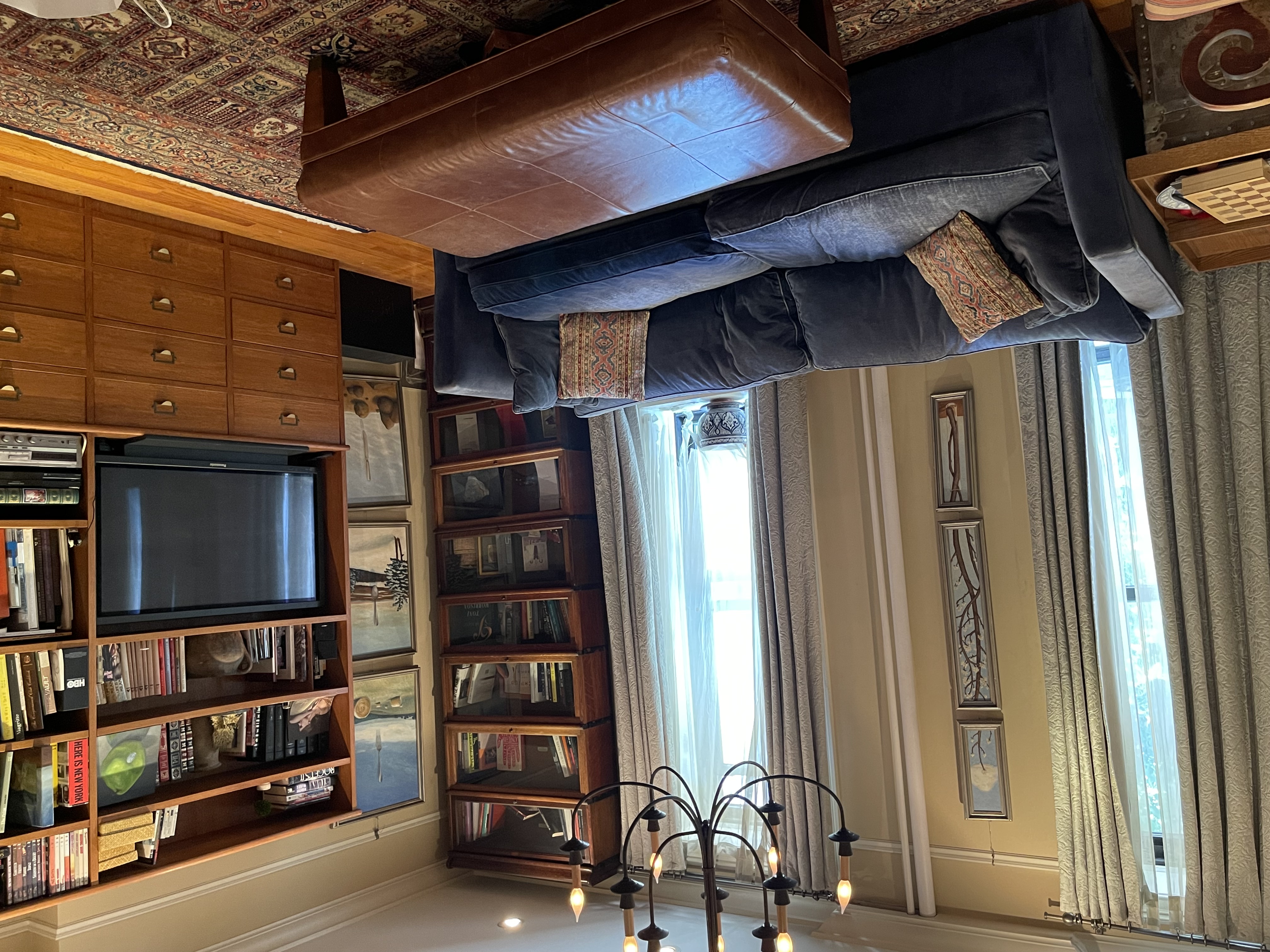 96 Perry Street, Unit B3 Manhattan, NY 10014 - Photo 1 of 16 a living room with furniture and a flat screen tv