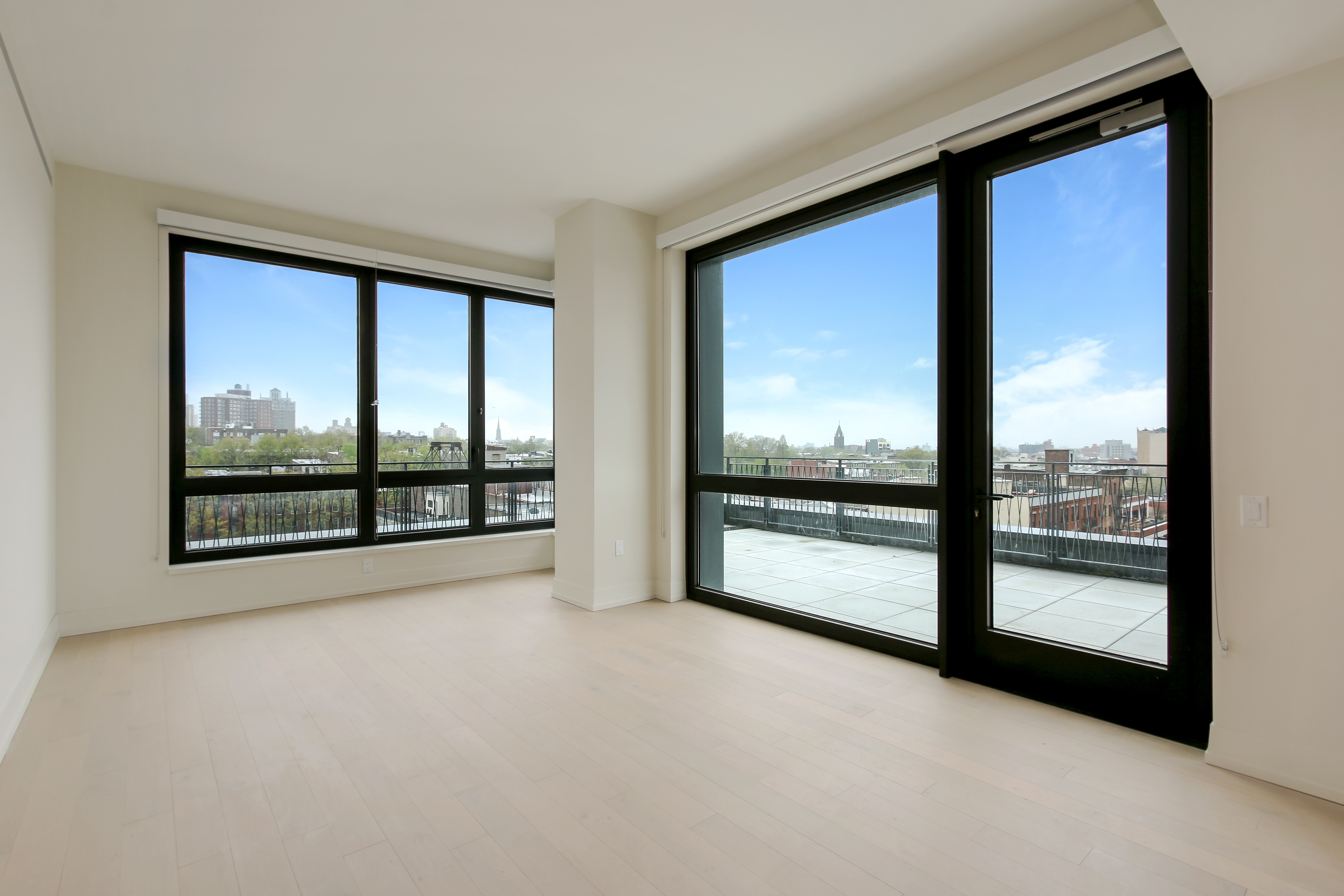 550 Vanderbilt Avenue, Unit 630 Brooklyn, NY 11238 - Photo 1 of 10 a view of an empty room with a large window