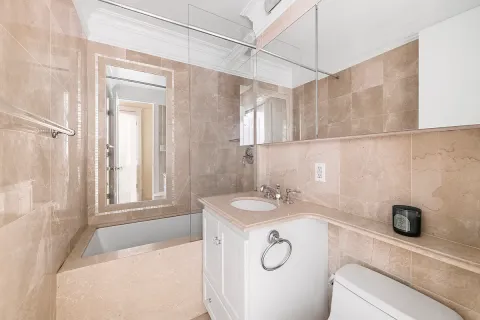 a bathroom with a sink and a shower