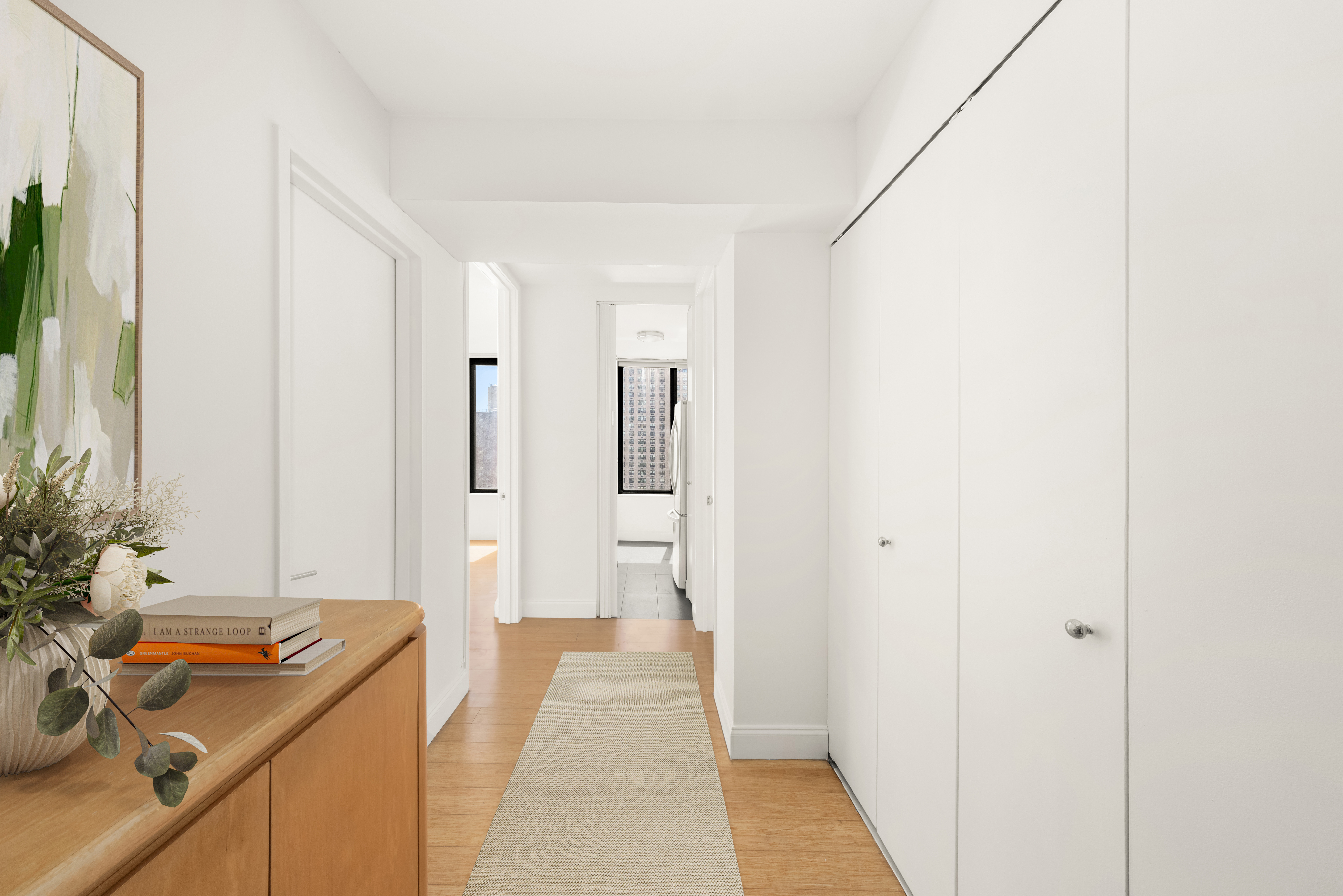 300 East 93rd Street, Unit 18E Manhattan, NY 10128 - Photo 5 of 15 a very nice looking room with a potted plant