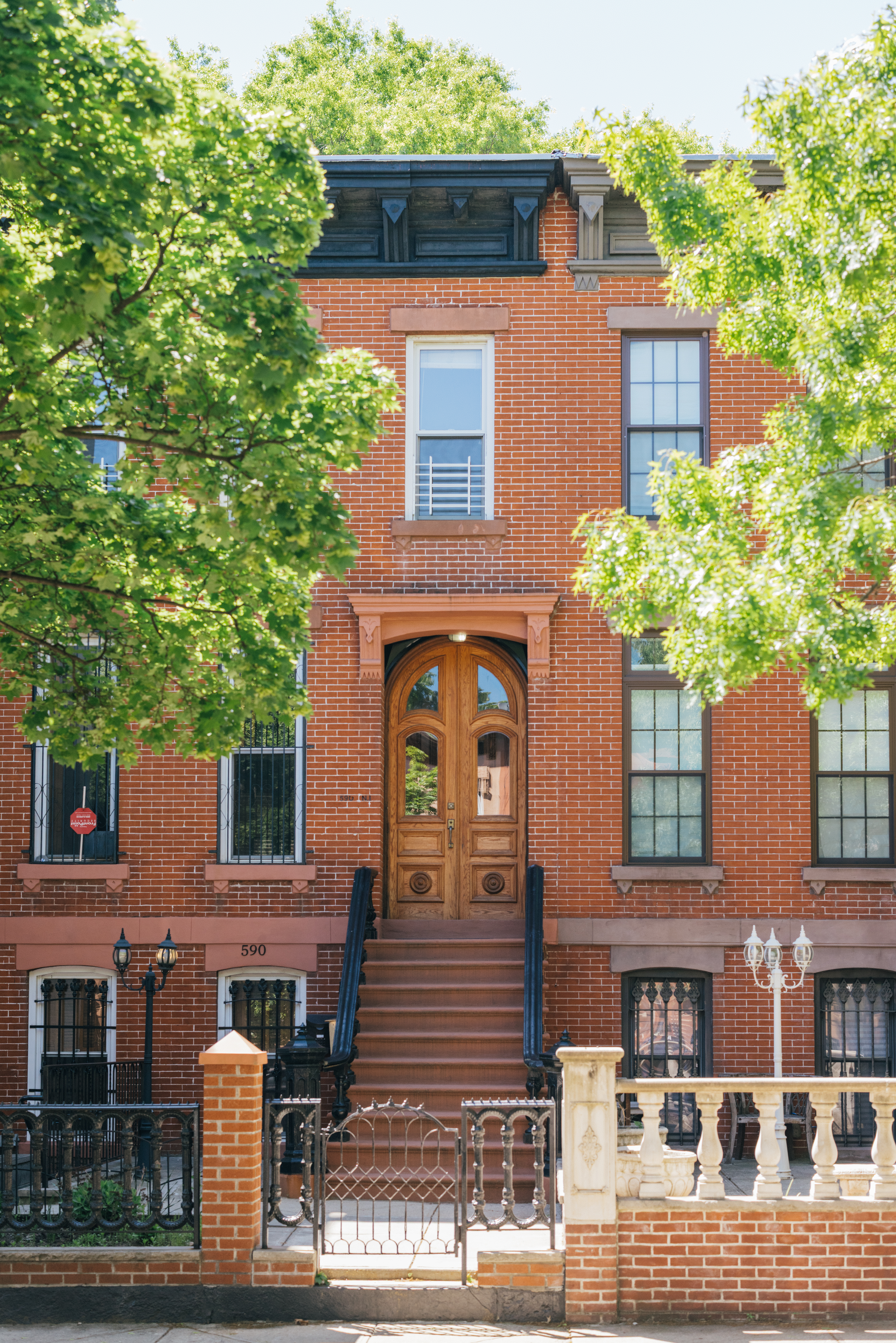 590 Monroe Street Brooklyn, NY 11221 - Photo 2 of 35 a front view of a house with garden