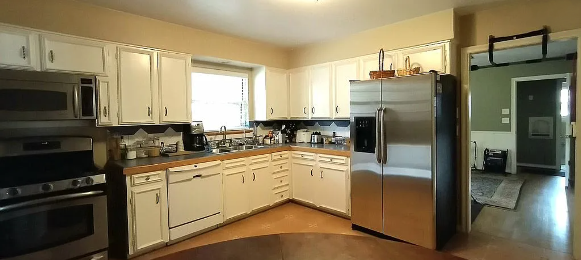 316 Classen Drive Dallas, TX 75218 - Photo 3 of 9 a kitchen with a refrigerator stove and microwave