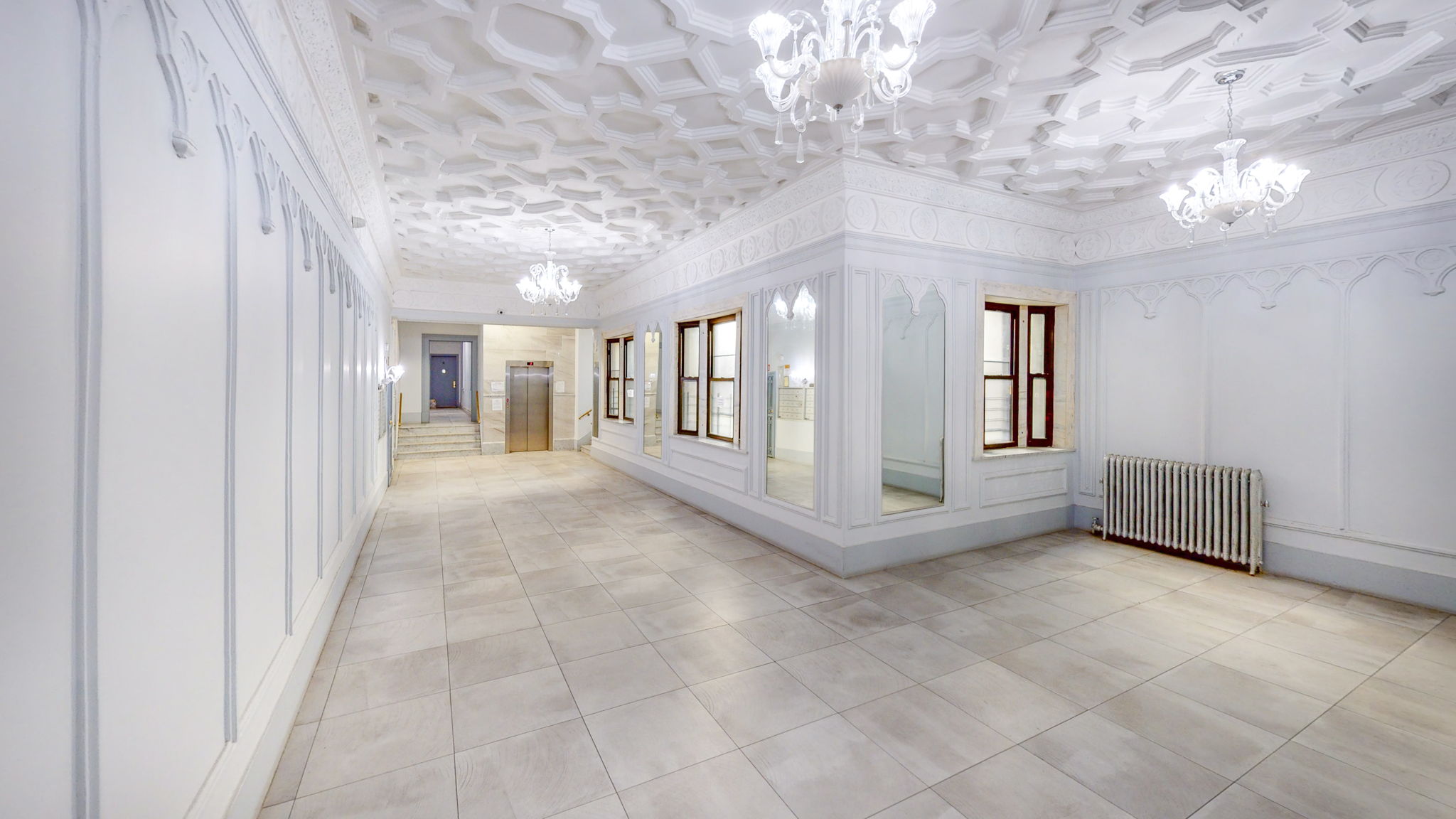 47 Fort Washington Avenue, Unit 55 Manhattan, NY 10032 - Photo 18 of 20 a view of a hallway with windows