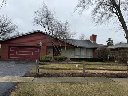a black and white photo of a refrigerator