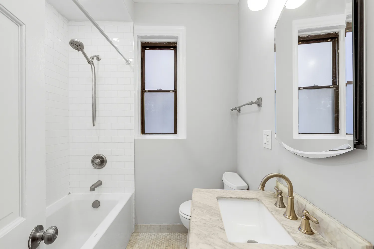 a bathroom with a sink and a bathtub
