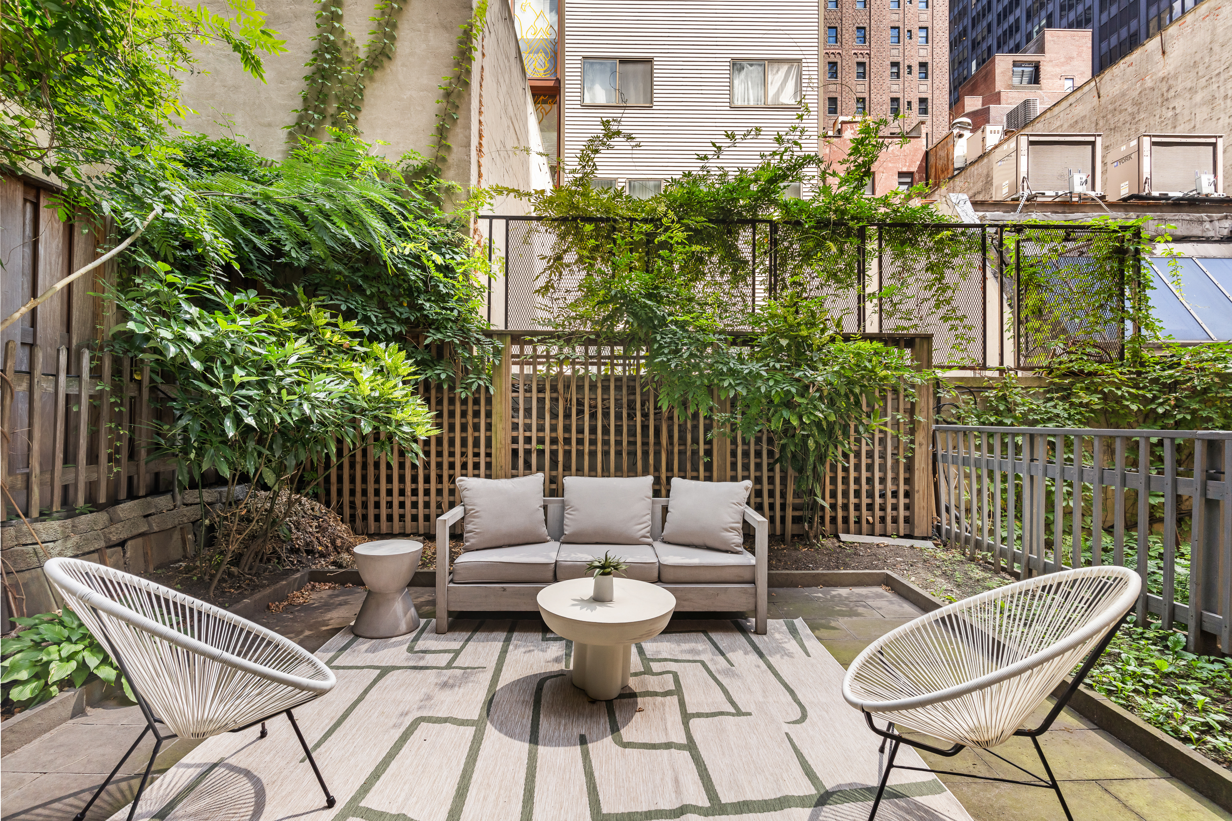 135 East 38th Street Manhattan, NY 10016 - Photo 4 of 32 a view of a patio on the roof deck