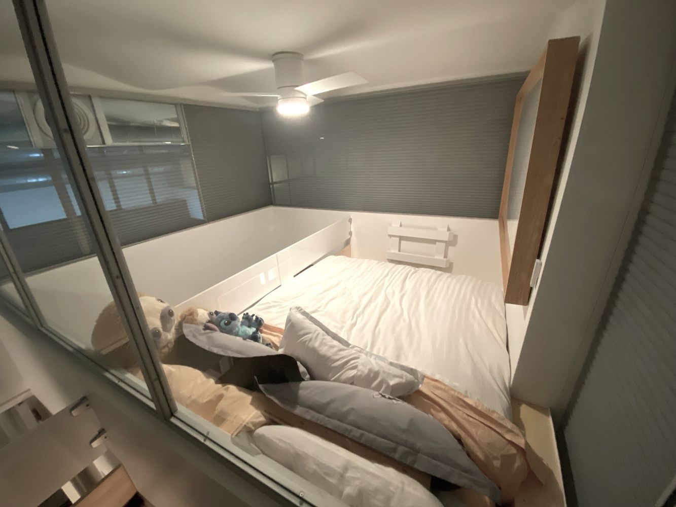 382 Lafayette Street, Unit 2 Manhattan, NY 10003 - Photo 15 of 19 a bedroom with a bed and glass door