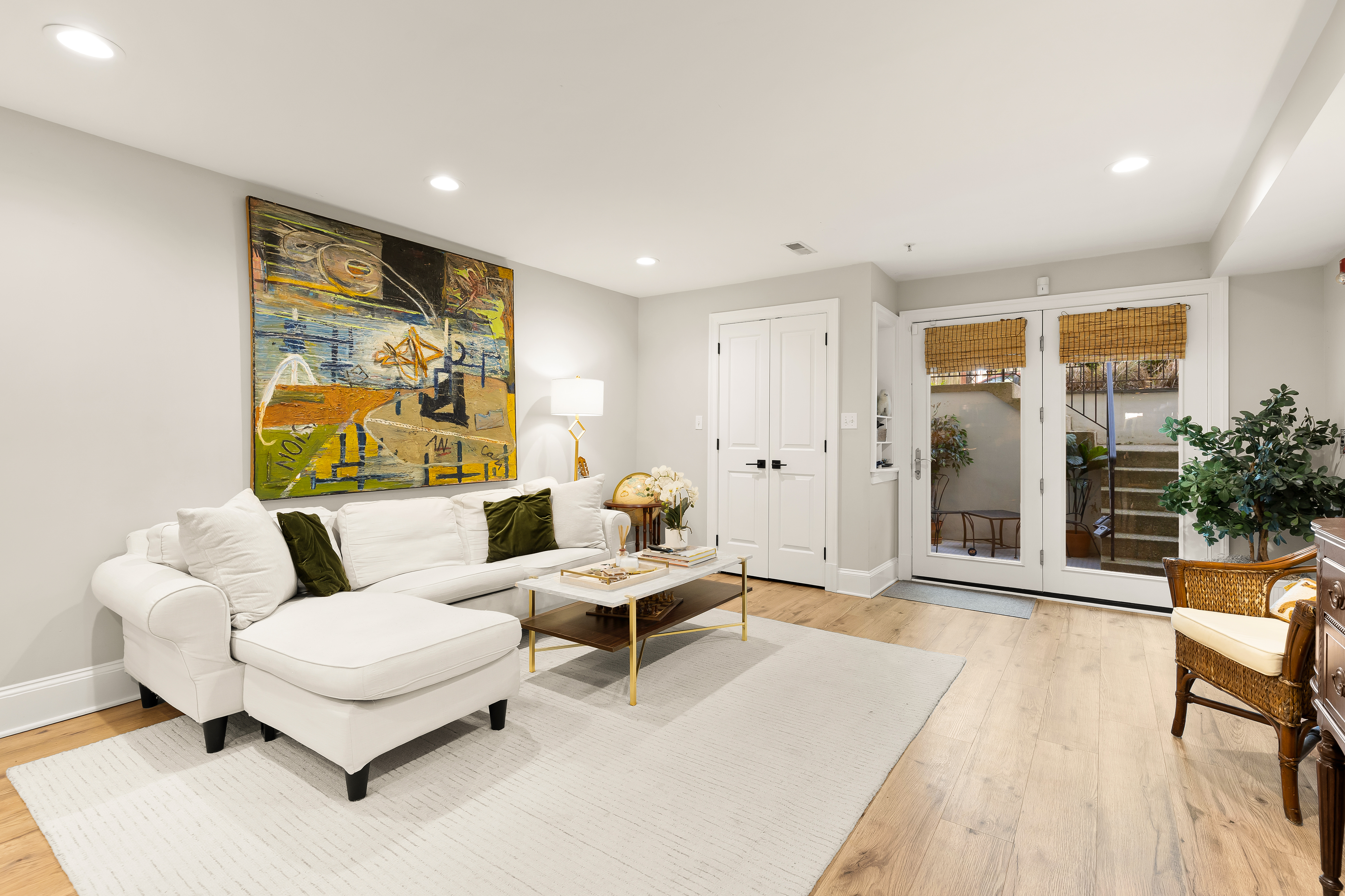 1354 Kenyon Street Northwest, Unit G Washington, DC 20010 - Photo 7 of 35 a living room with furniture and wooden floor