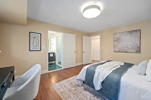 a view of a patio with table and chairs and potted plants
