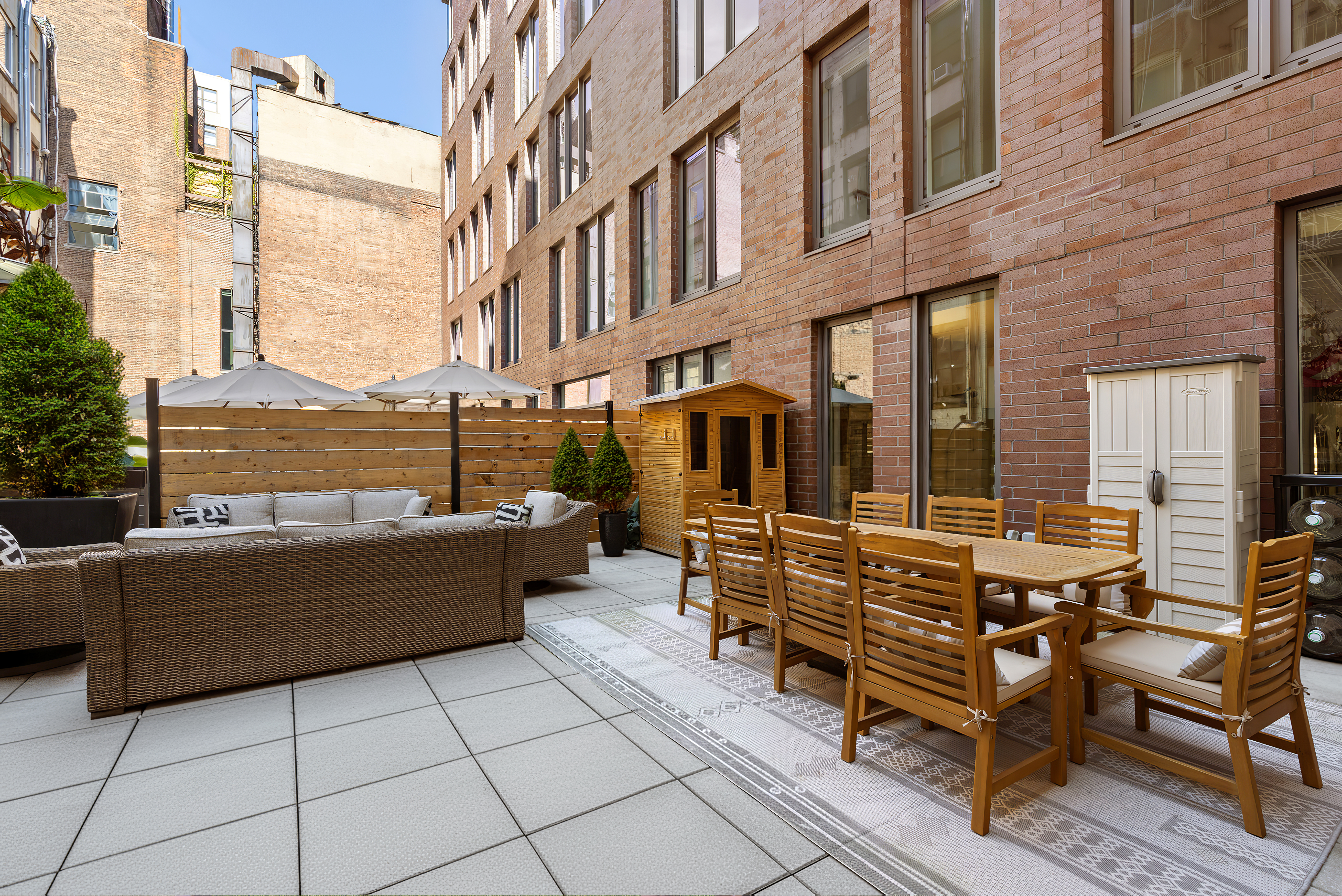 210 Lafayette Street, Unit 2D Manhattan, NY 10012 - Photo 12 of 14 a view of a building with outdoor seating