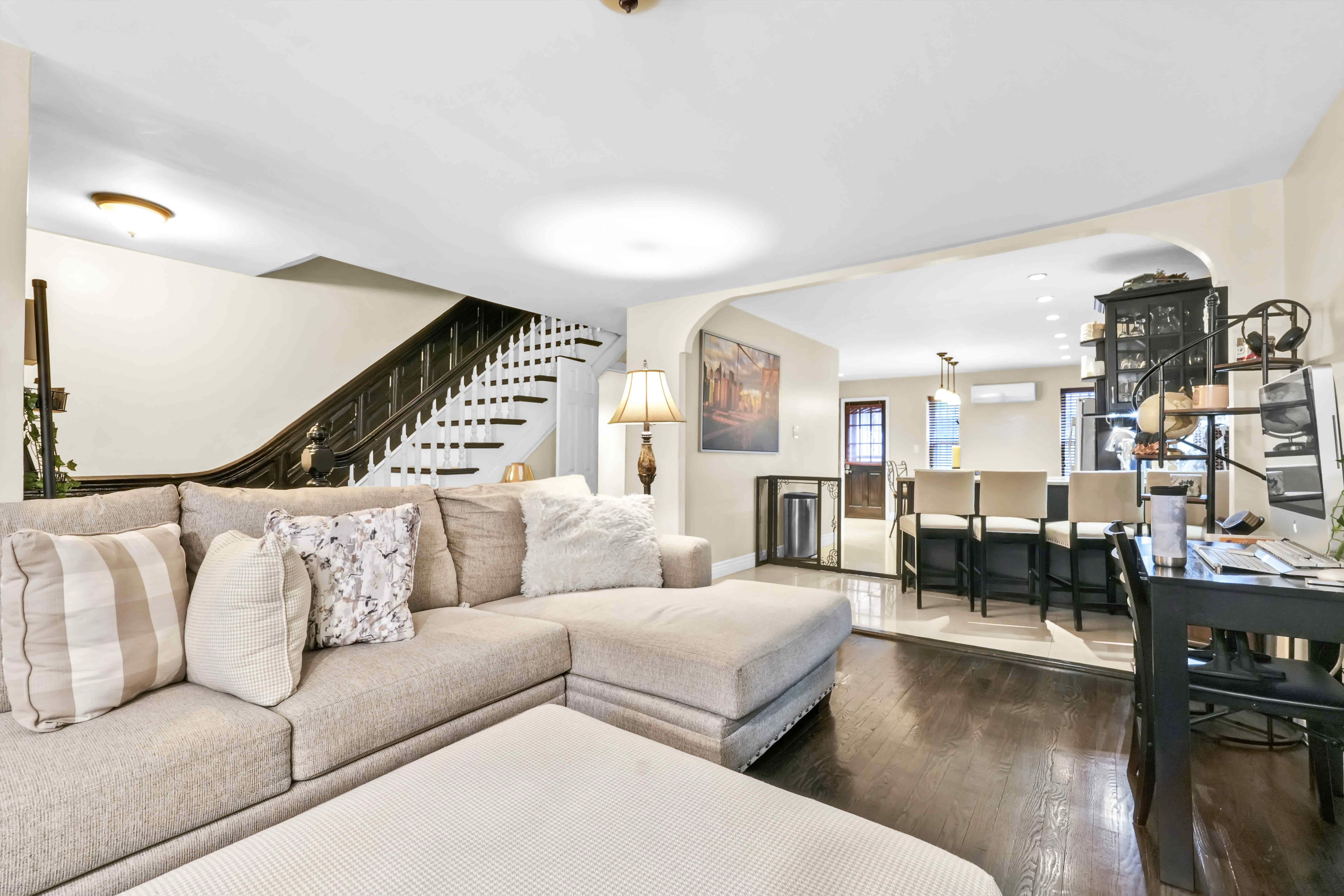 519 Monroe Street Brooklyn, NY 11221 - Photo 30 of 55 a living room with furniture and wooden floor