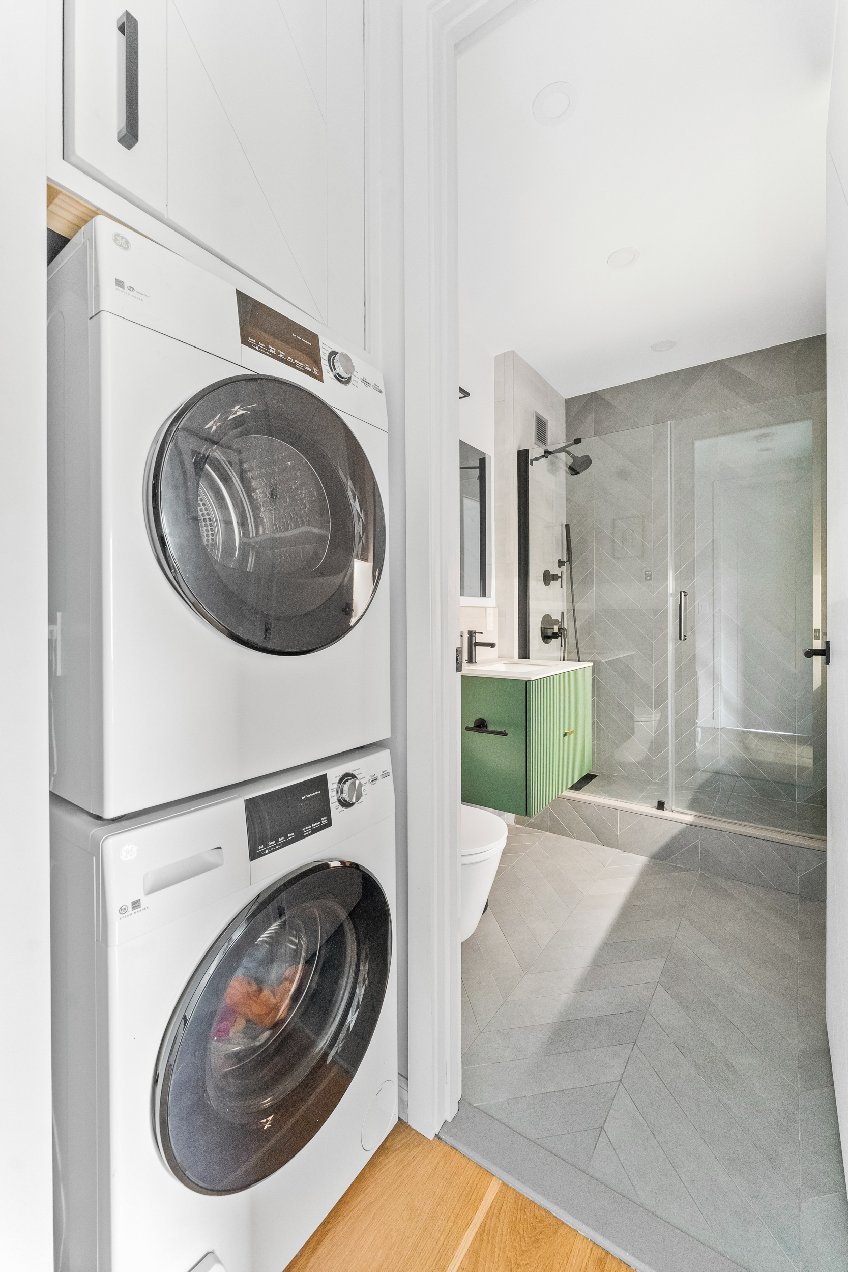 55 Poplar Street, Unit 6A Brooklyn, NY 11201 - Photo 9 of 13 a view of a storage & utility room with washer and dryer