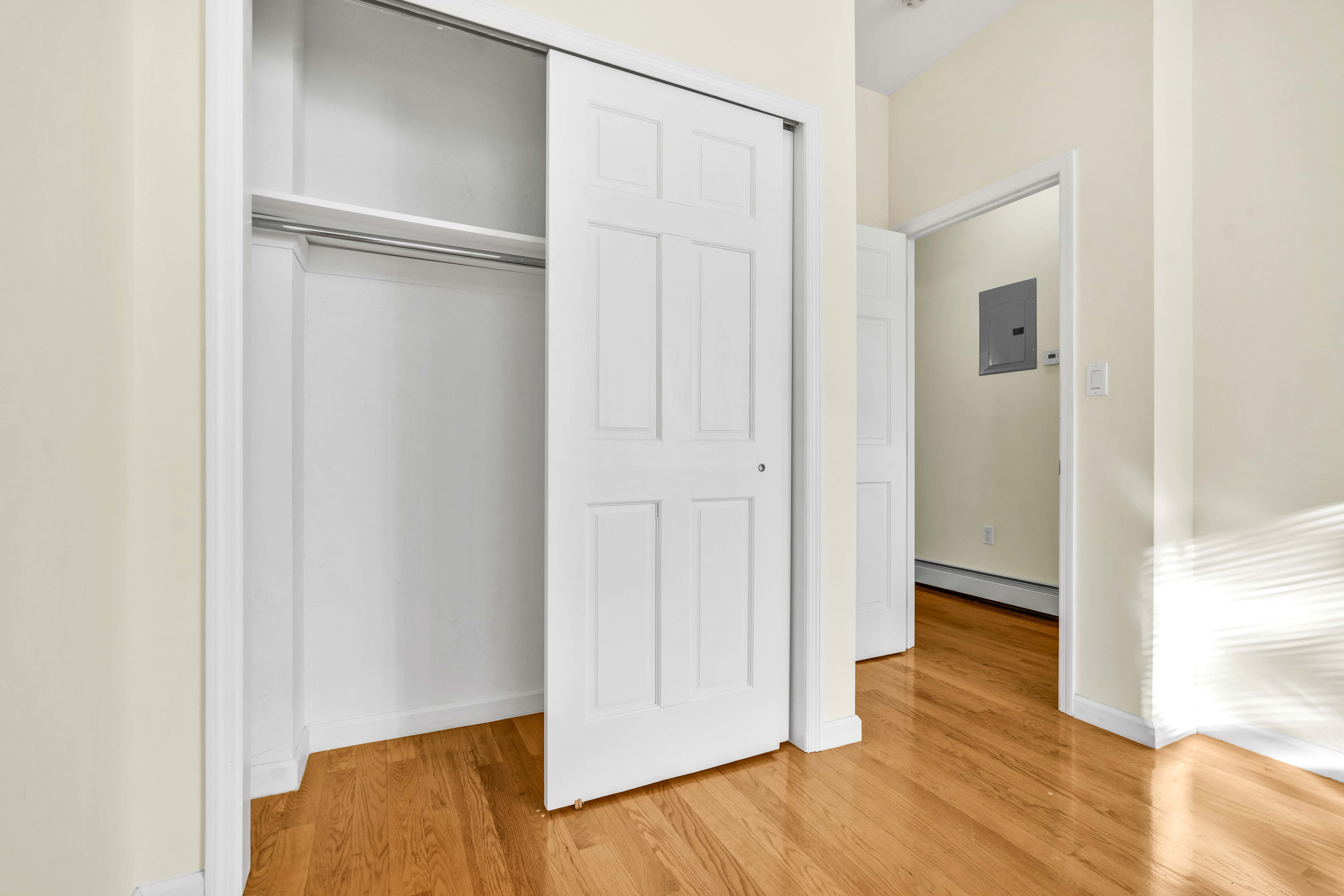 1892 Bergen Street, Unit 2 Brooklyn, NY 11233 - Photo 5 of 24 a view of empty room with wooden floor