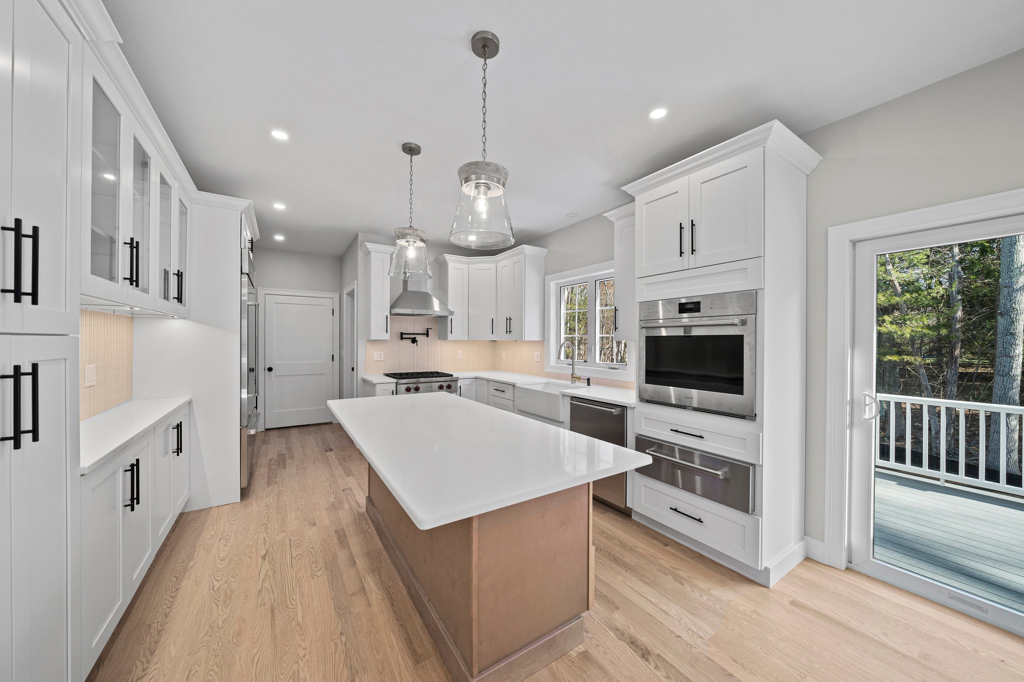 3 Everendon Road Canton, MA 02021 - Photo 3 of 35 a large kitchen with kitchen island a large counter space a sink appliances and cabinets