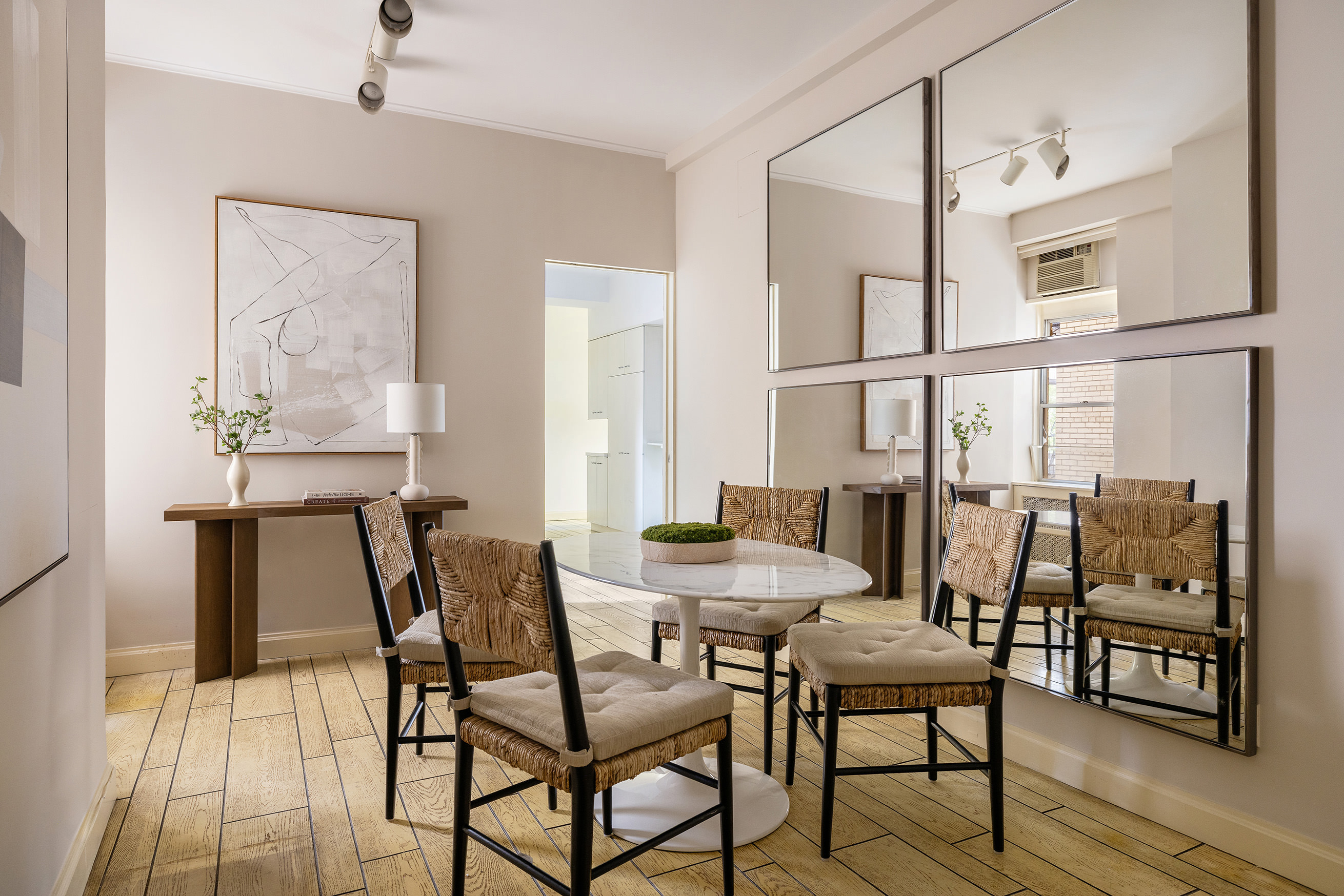 1120 5th Avenue, Unit 7B Manhattan, NY 10128 - Photo 12 of 17 a view of a dining room with furniture window and wooden floor