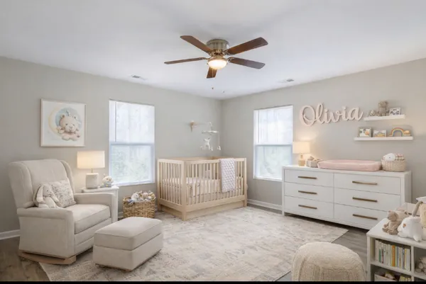 a living room with furniture and a window