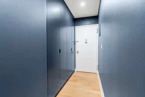 a view of a building with a street light pole