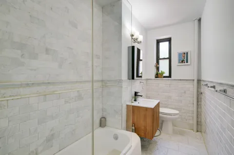 $399,000 | 143-50 Hoover Avenue, Unit 107 | Briarwood