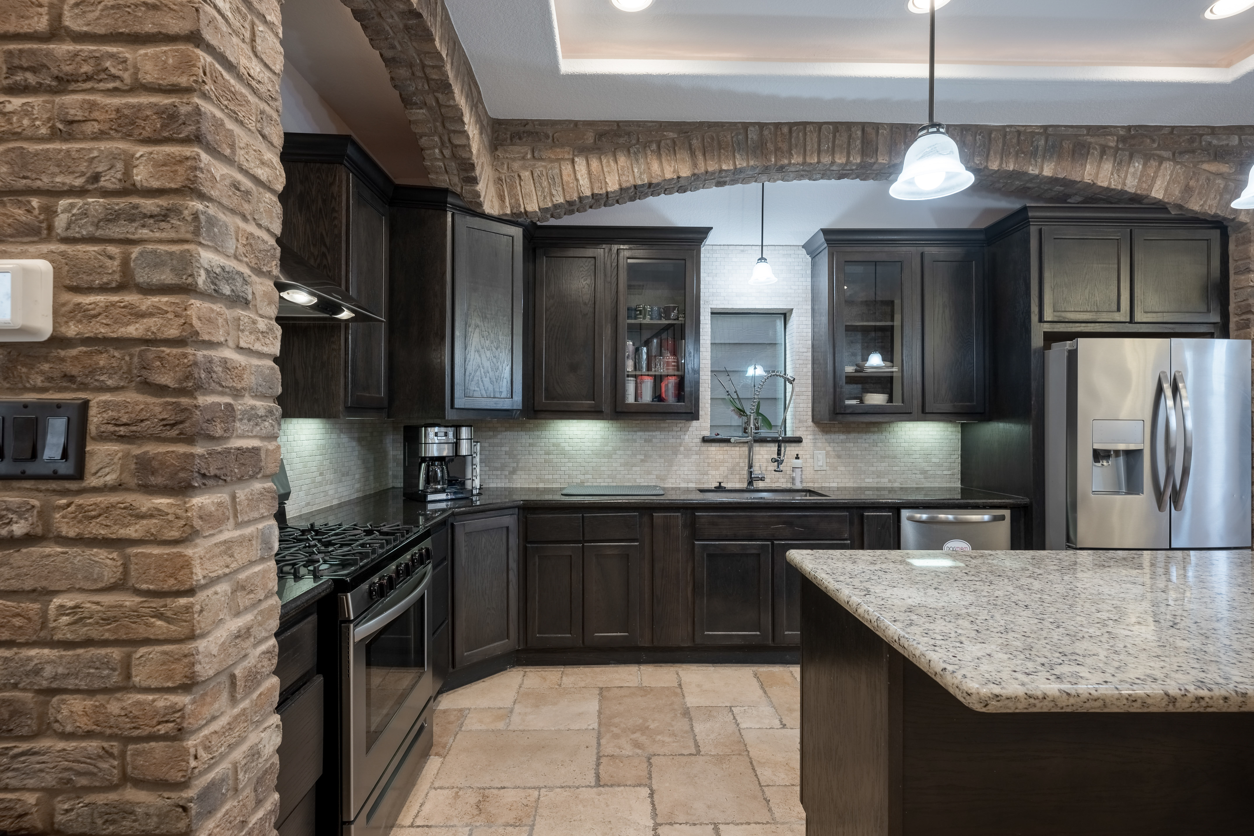 406 Fenn Street Houston, TX 77018 - Photo 5 of 33 a kitchen with a sink and a refrigerator