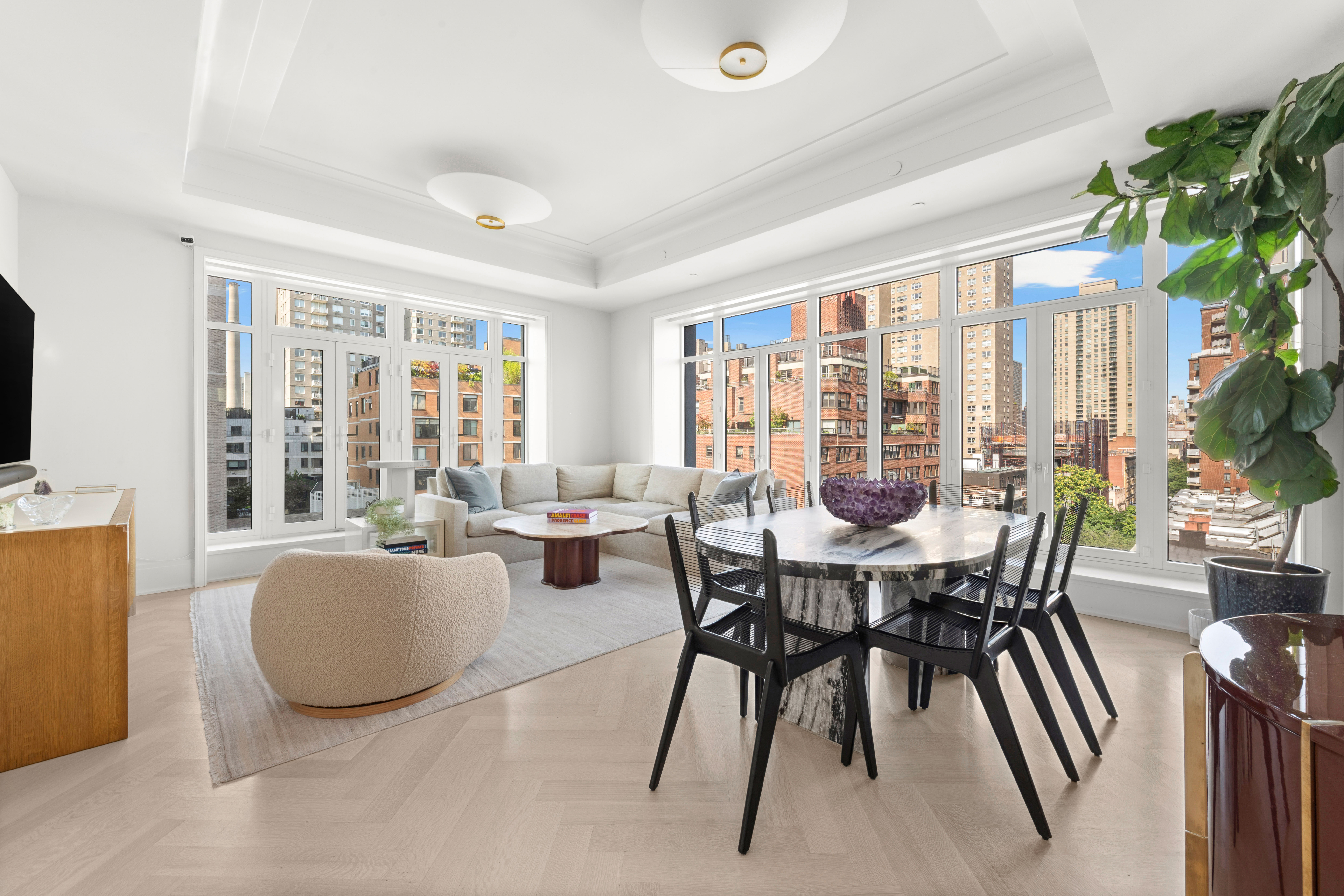 40 East End Avenue, Unit 9B Manhattan, NY 10028 - Photo 2 of 25 a view of a dining room with furniture window and outside view