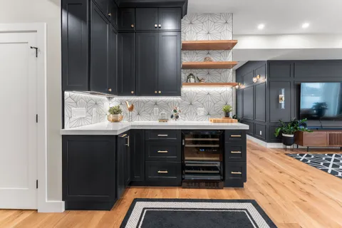 a bathroom with a sink double vanity and a bathtub