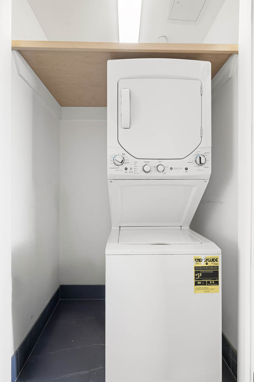 195 Hawthorne Street, Unit 5E Brooklyn, NY 11225 - Photo 19 of 23 a utility room with dryer and washer