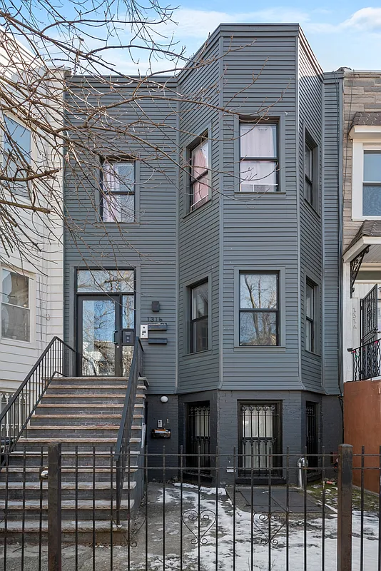 1316 Jefferson Avenue, Unit 2 Brooklyn, NY 11221 - Photo 9 of 10 a front view of a house with a lots of windows